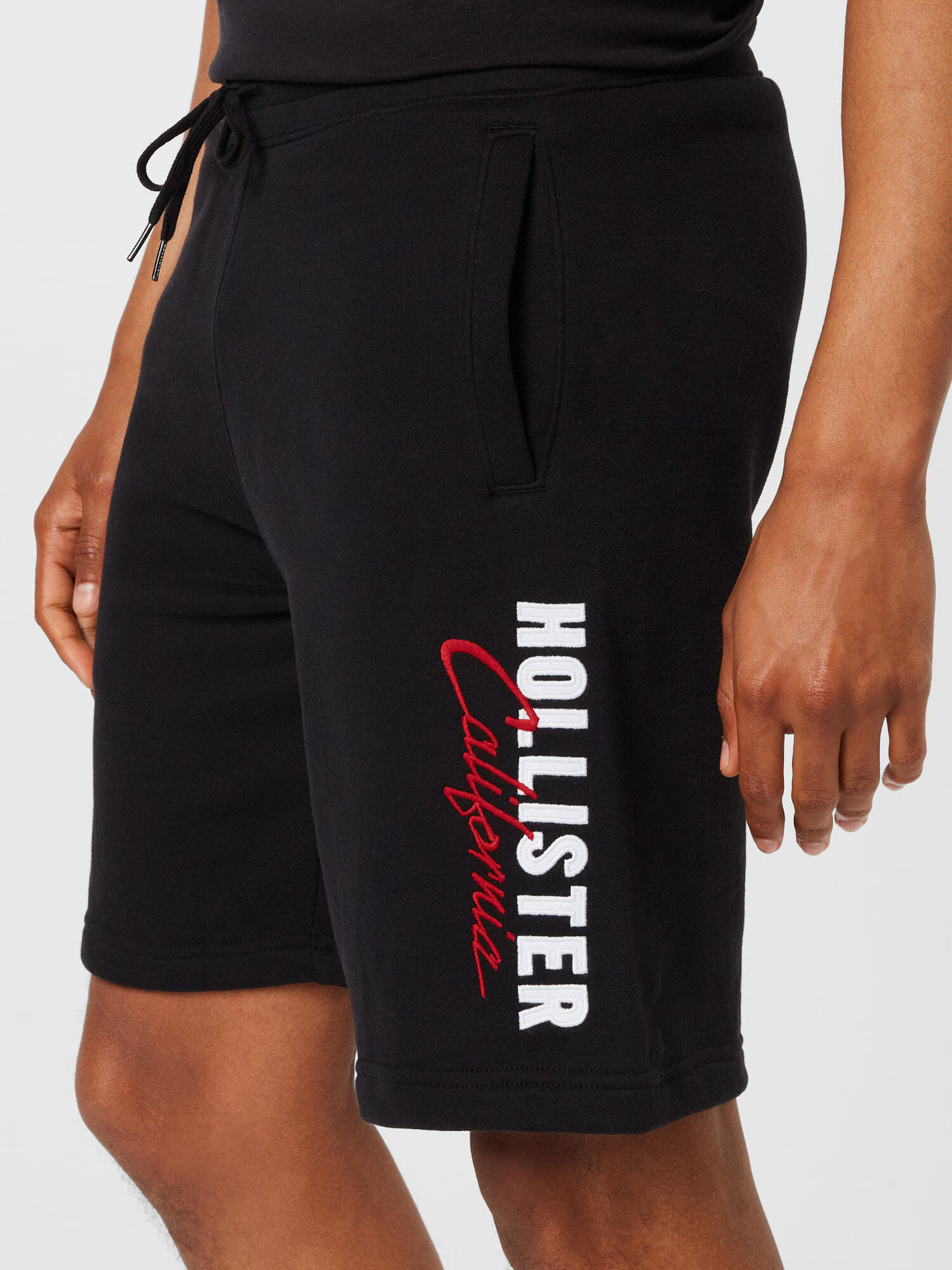 HOLLISTER Pantaloni roșu / negru / alb - Pled.ro