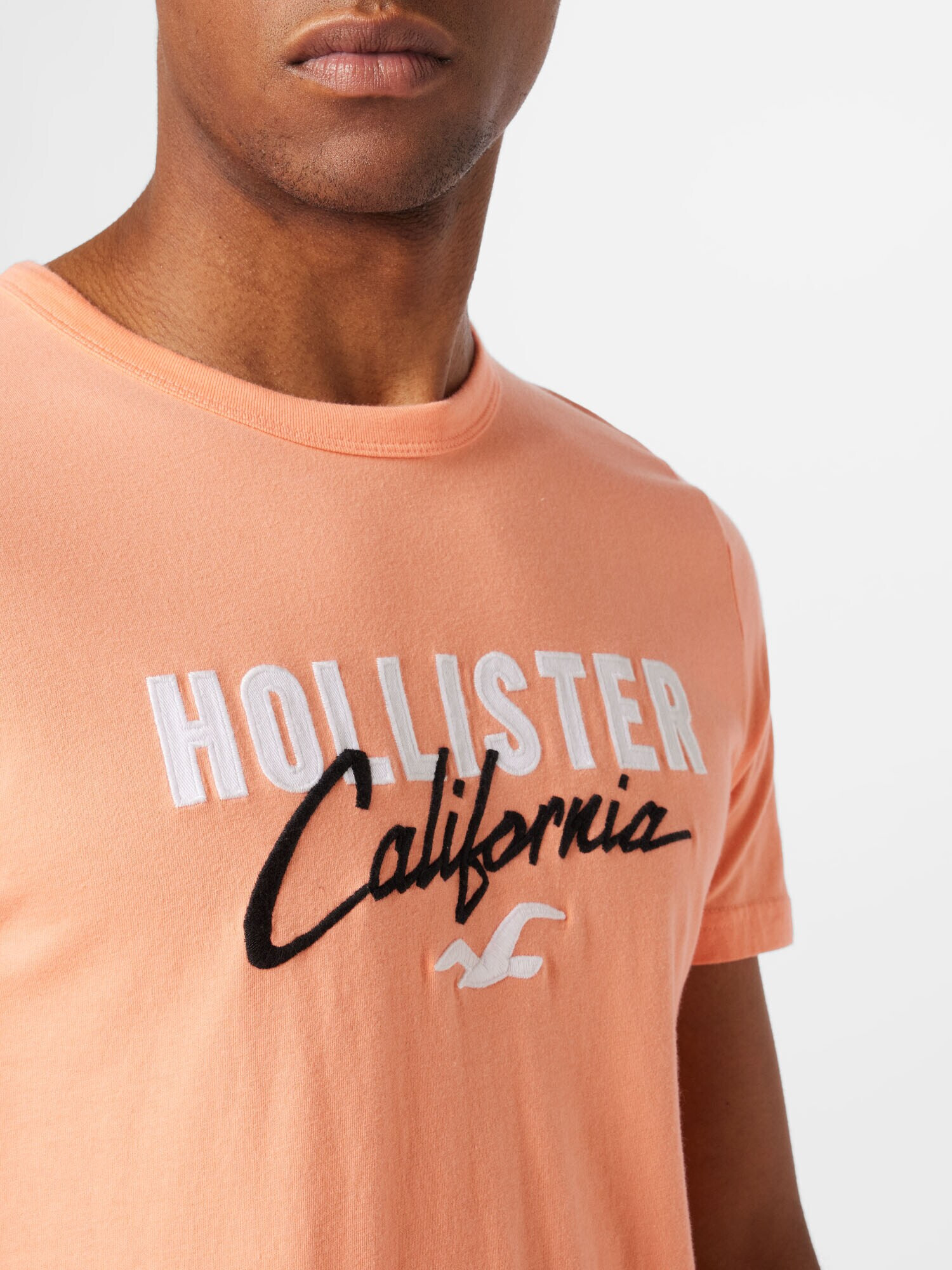 HOLLISTER Tricou portocaliu caisă / negru / alb - Pled.ro