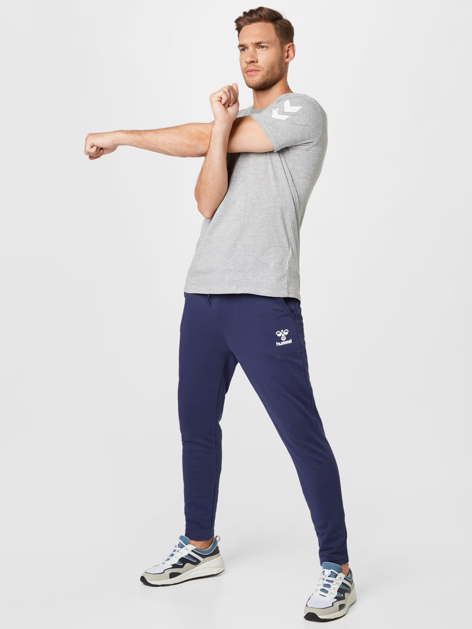 Hummel Pantaloni sport bleumarin / alb - Pled.ro