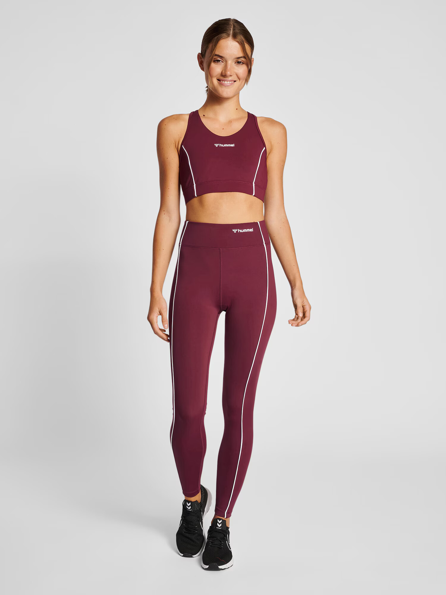 Hummel Pantaloni sport mov zmeură / alb - Pled.ro