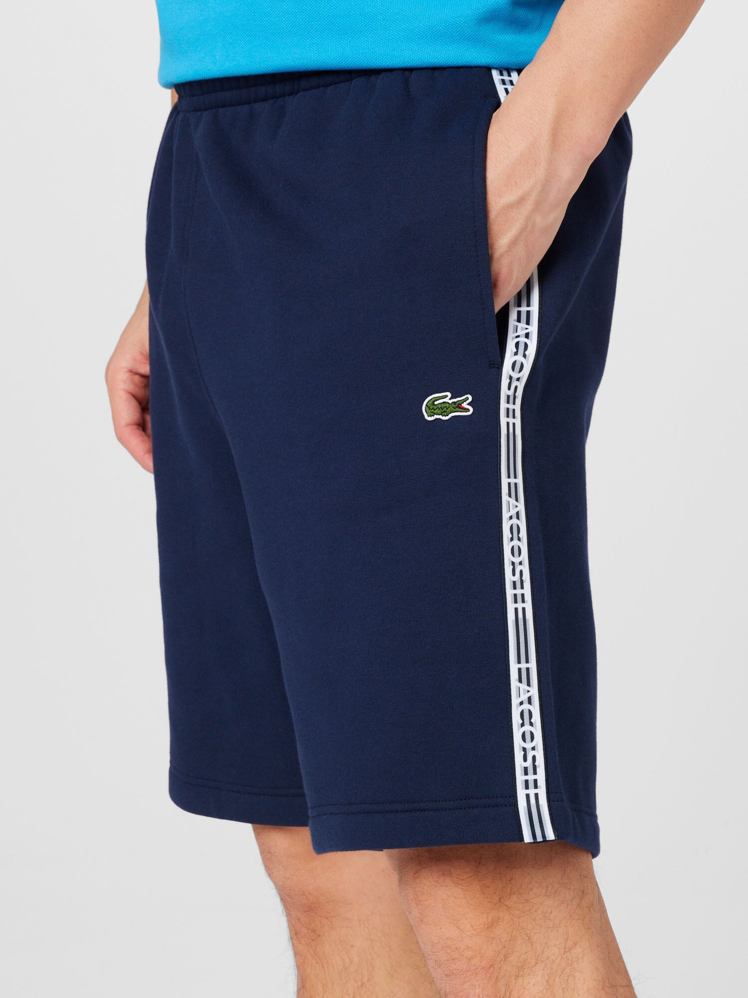 LACOSTE Pantaloni bleumarin / verde / alb - Pled.ro