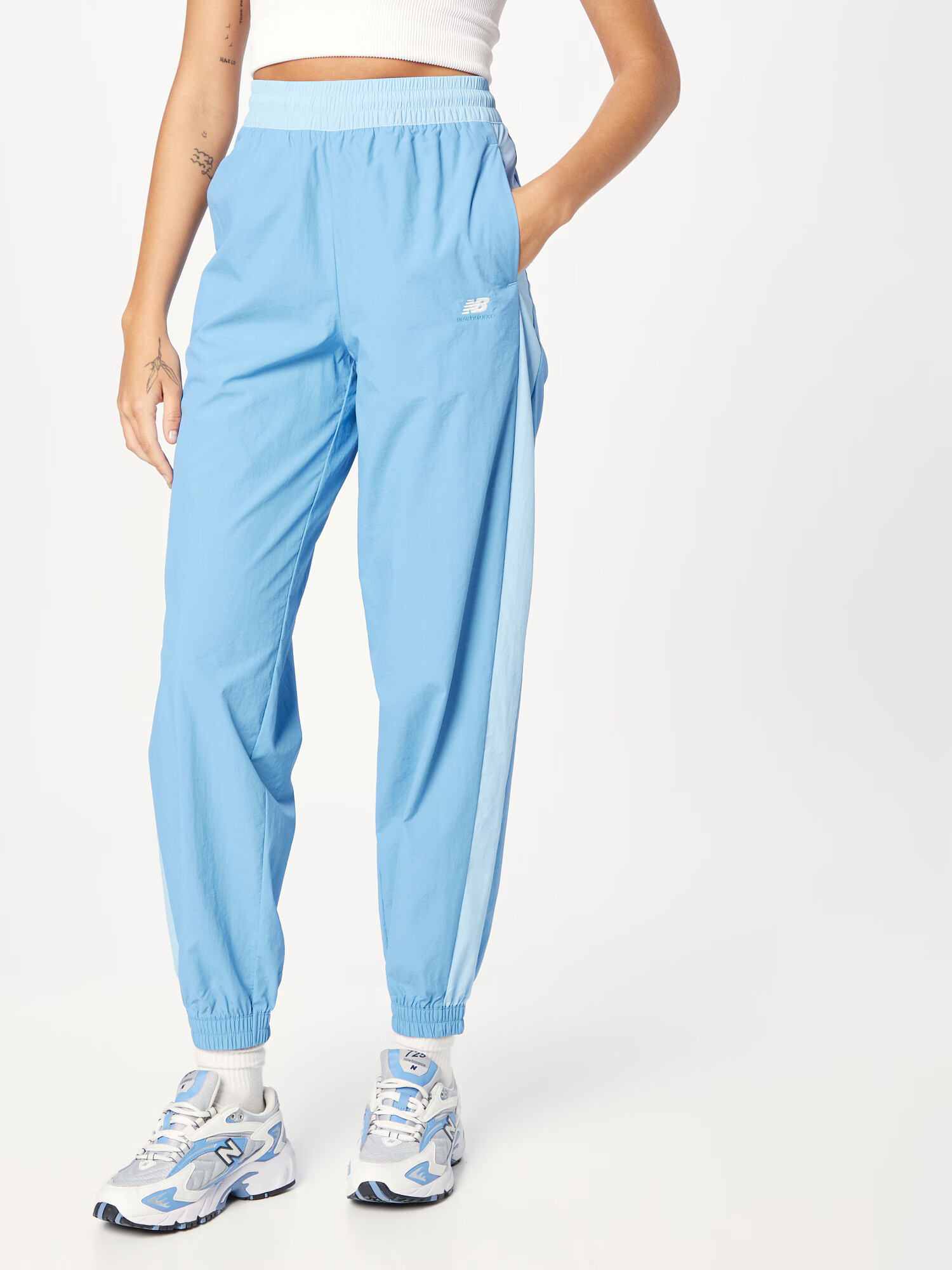 new balance Pantaloni sport 'Athletics' azuriu / albastru pastel / alb - Pled.ro