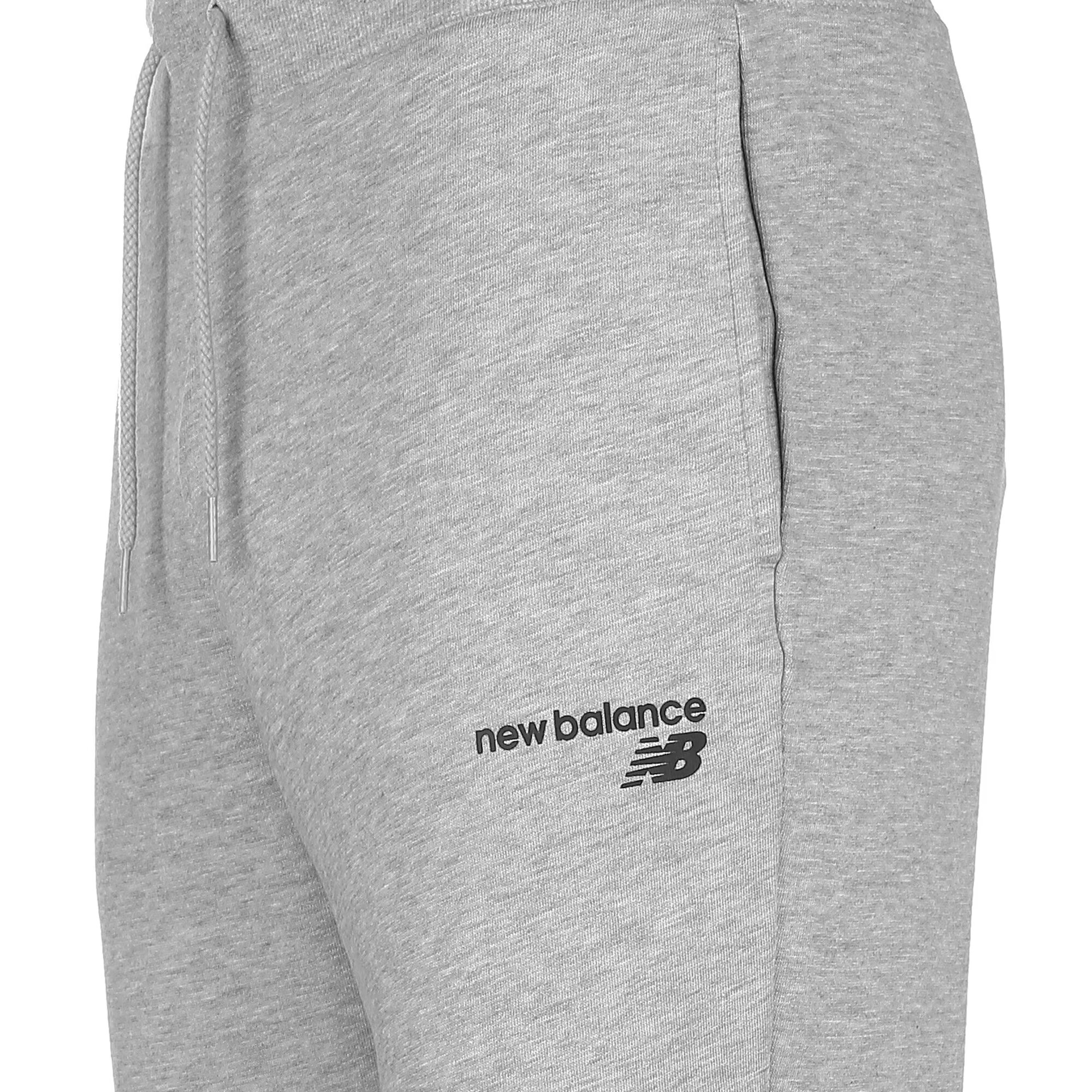 new balance Pantaloni gri amestecat / negru - Pled.ro