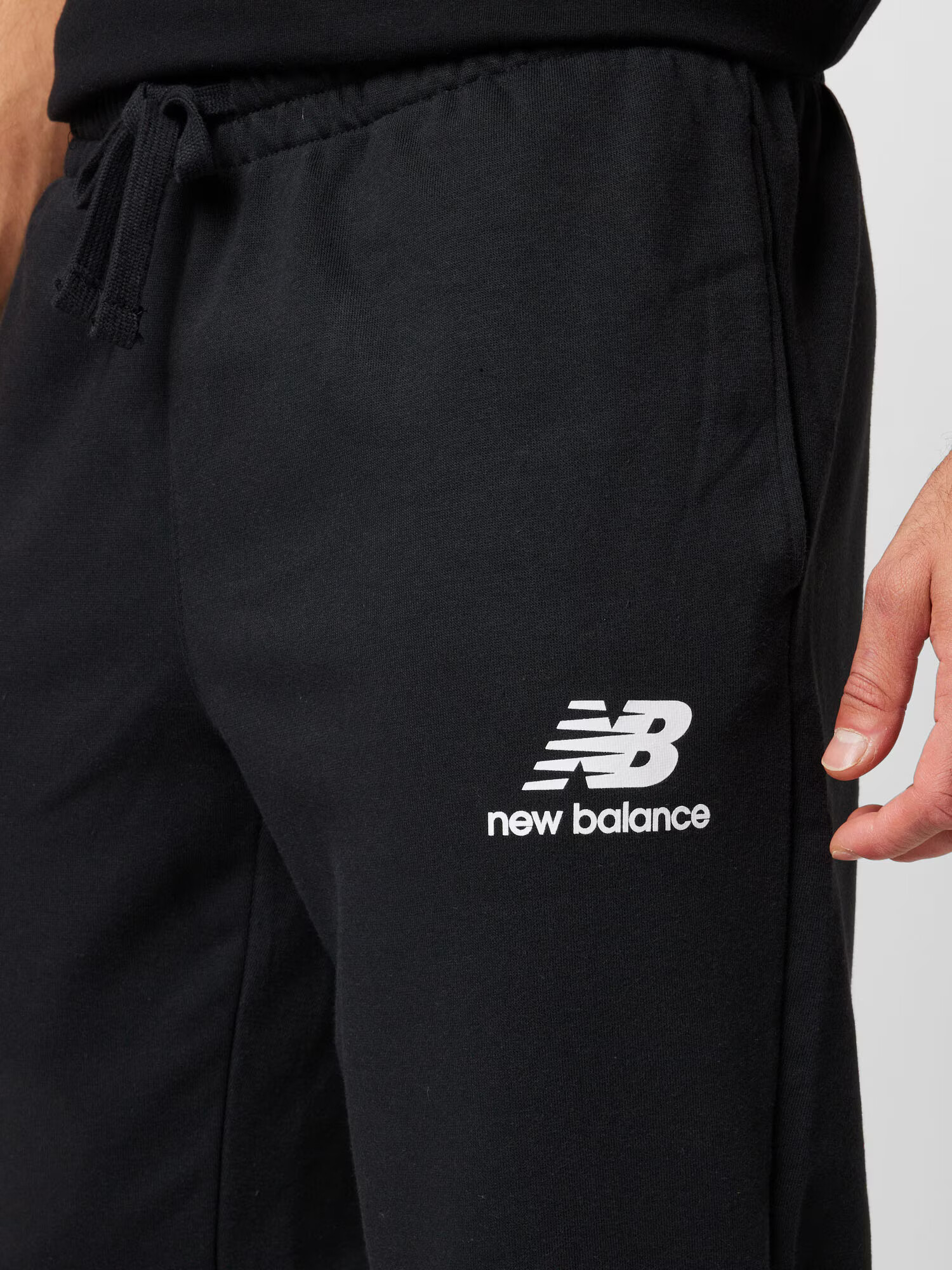 new balance Pantaloni negru / alb - Pled.ro