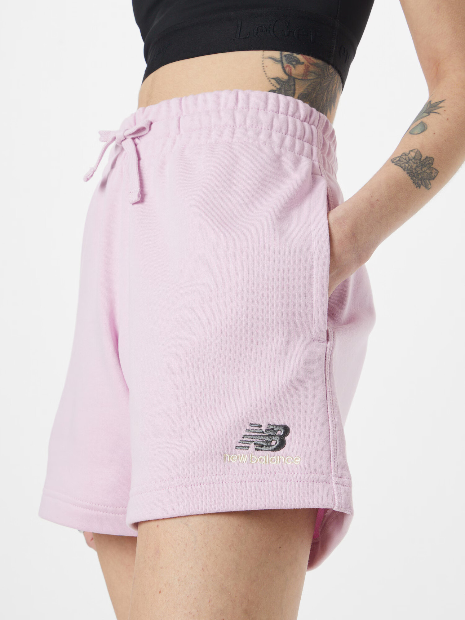 new balance Pantaloni roz / negru - Pled.ro