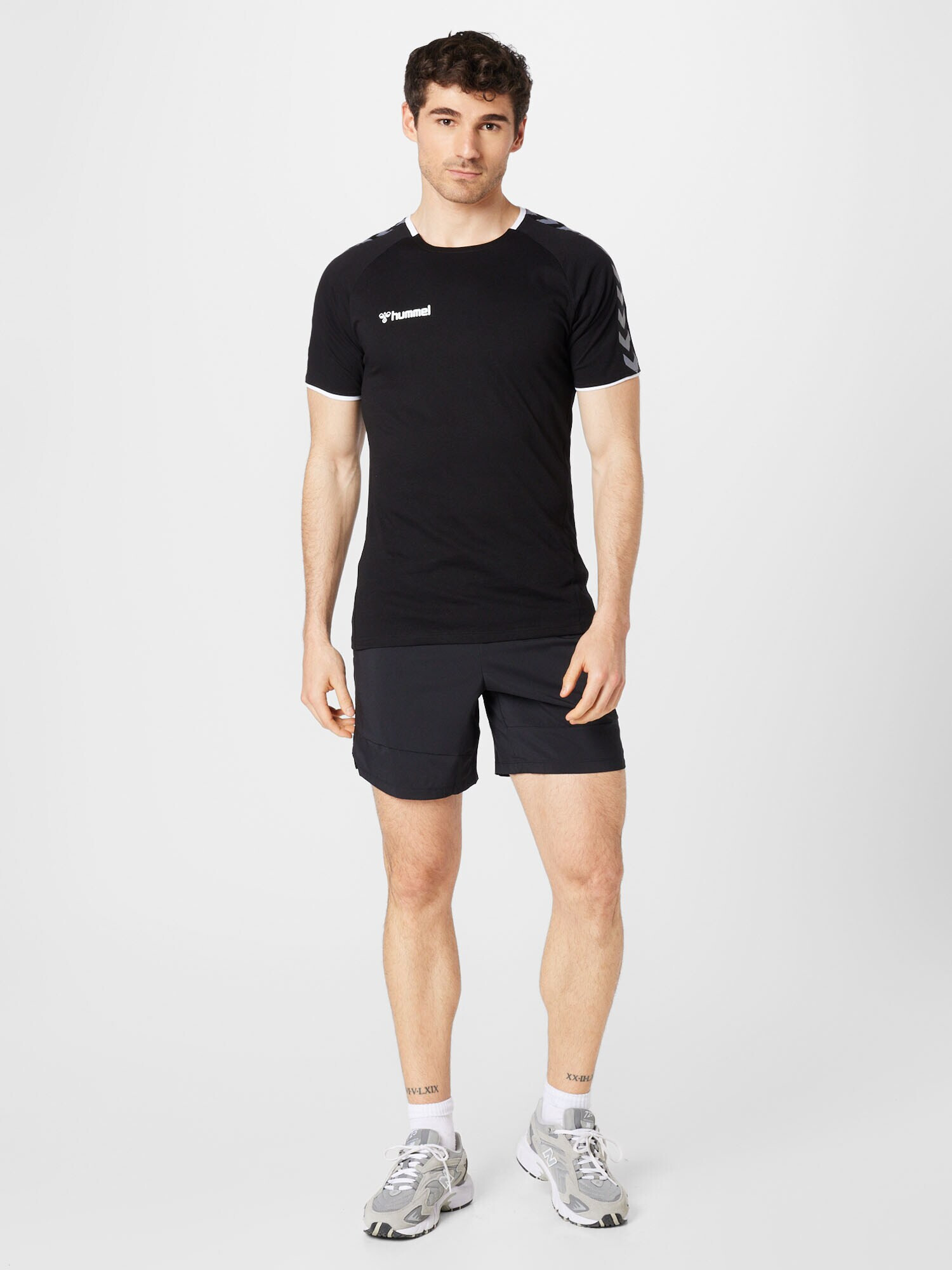 new balance Pantaloni sport '7 Inch Tenacity Solid' negru / alb - Pled.ro