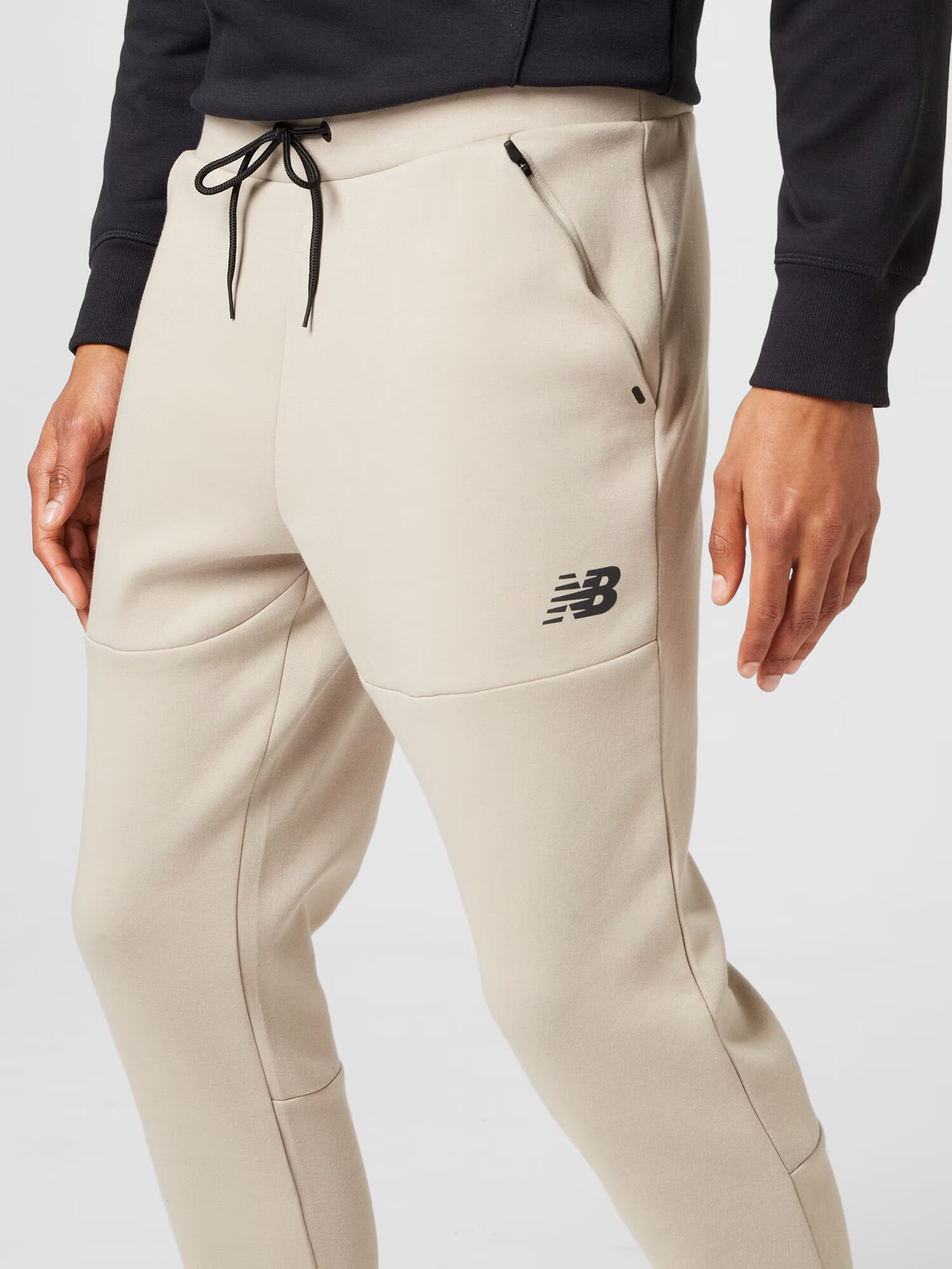 new balance Pantaloni sport gri piatră / negru - Pled.ro