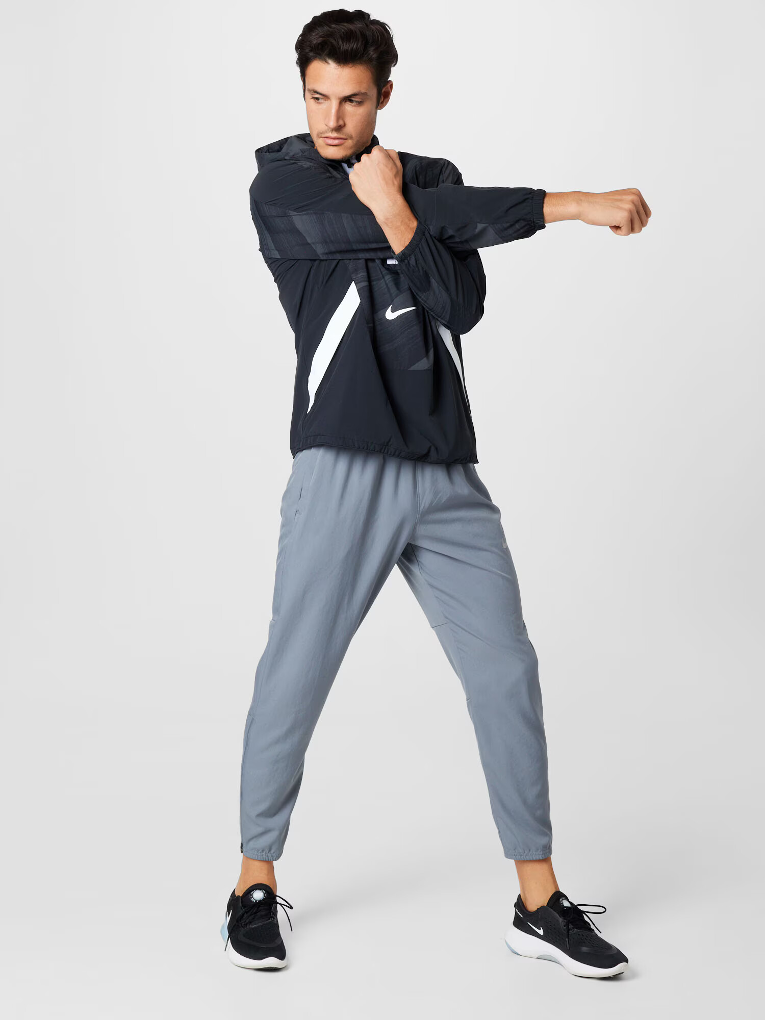 NIKE Pantaloni sport 'Challenger' gri / alb - Pled.ro