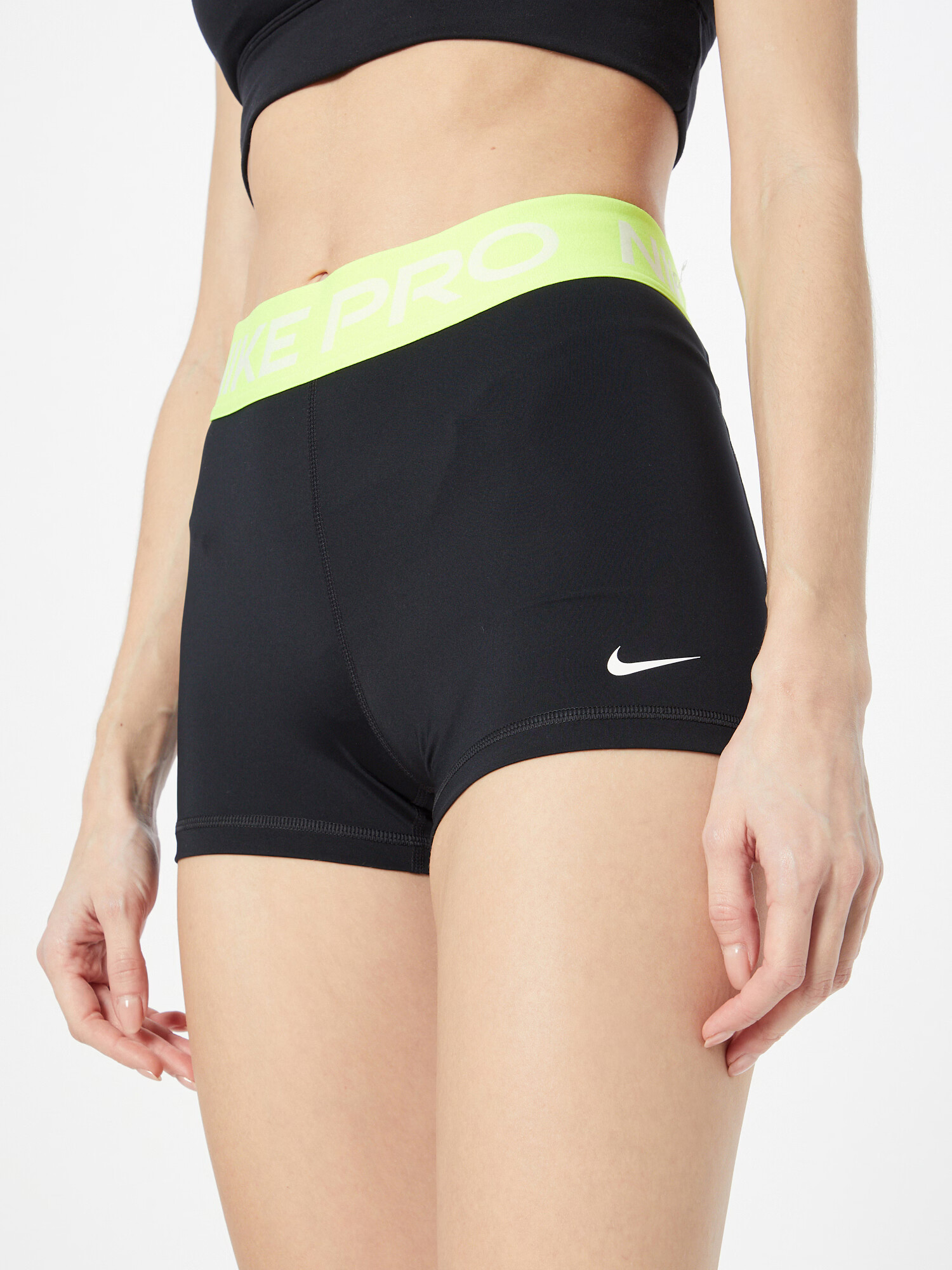 NIKE Pantaloni sport galben neon / negru / alb - Pled.ro