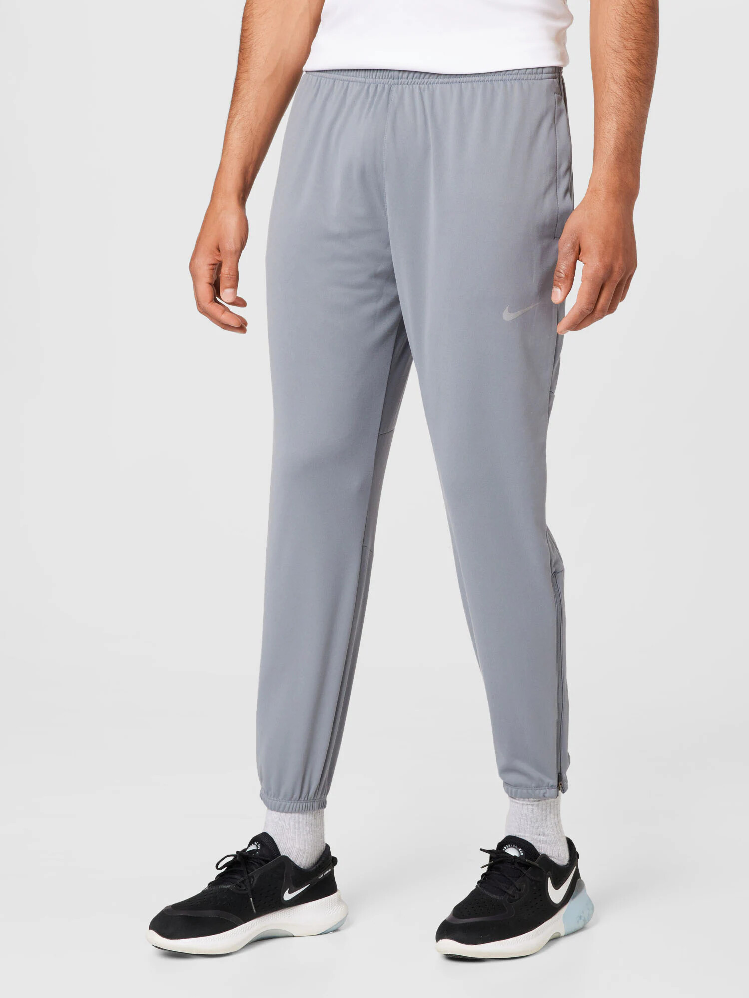 NIKE Pantaloni sport gri - Pled.ro