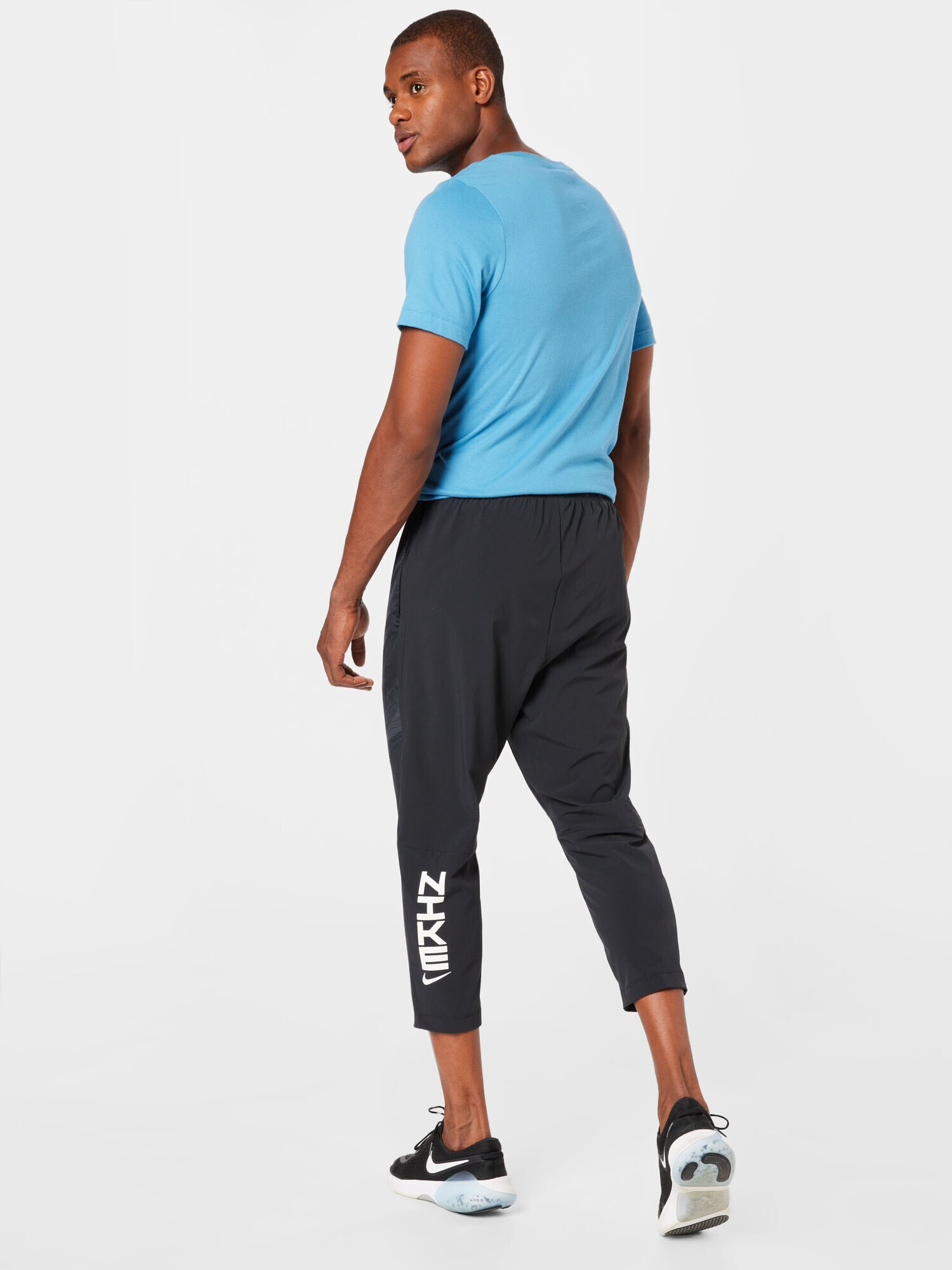 NIKE Pantaloni sport gri închis / negru - Pled.ro