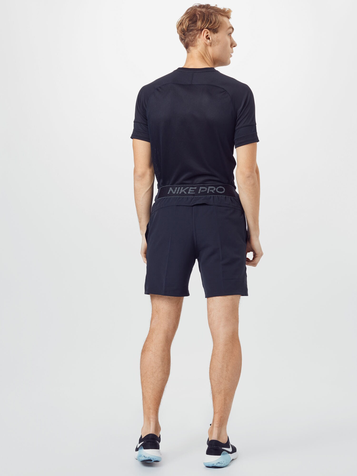 NIKE Pantaloni sport gri închis / negru - Pled.ro