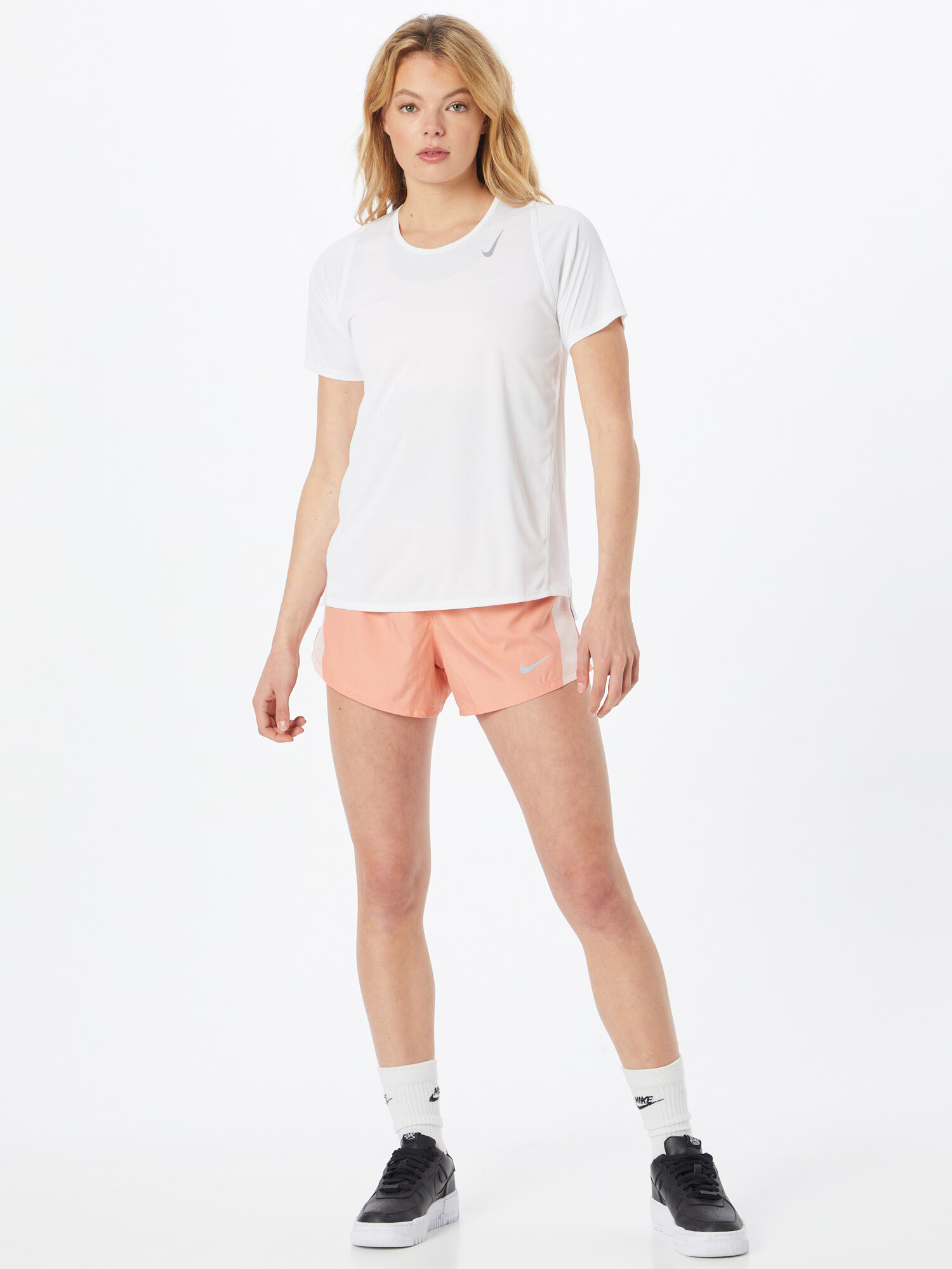 NIKE Pantaloni sport portocaliu pastel / alb - Pled.ro