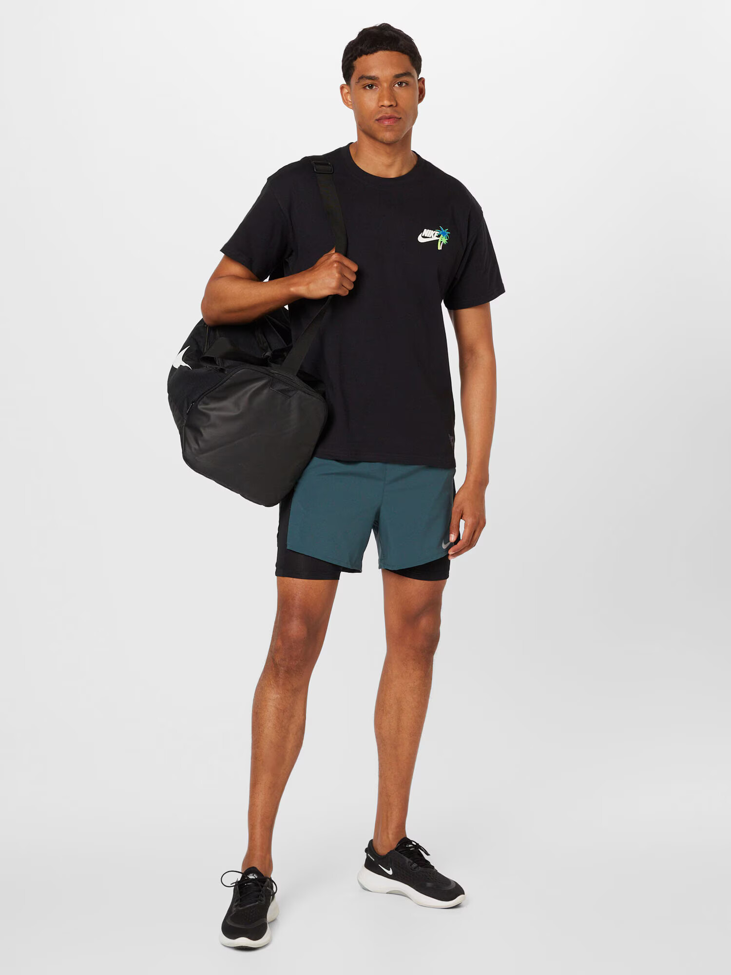 NIKE Pantaloni sport 'Stride' verde petrol / negru - Pled.ro