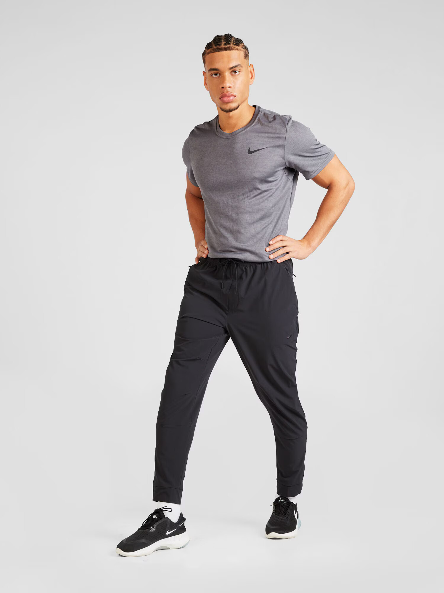 NIKE Pantaloni sport 'Unlimited' negru - Pled.ro