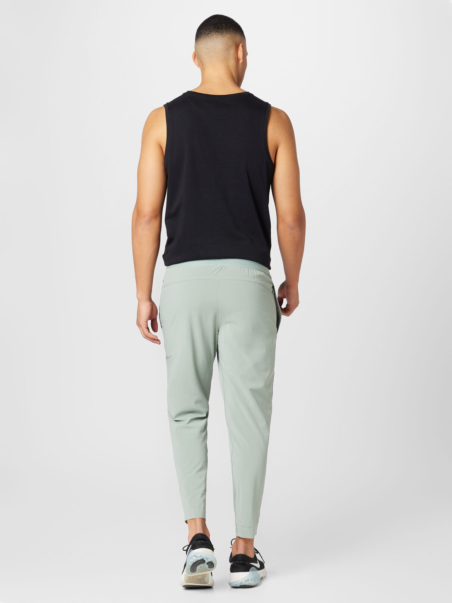 NIKE Pantaloni sport verde mentă - Pled.ro