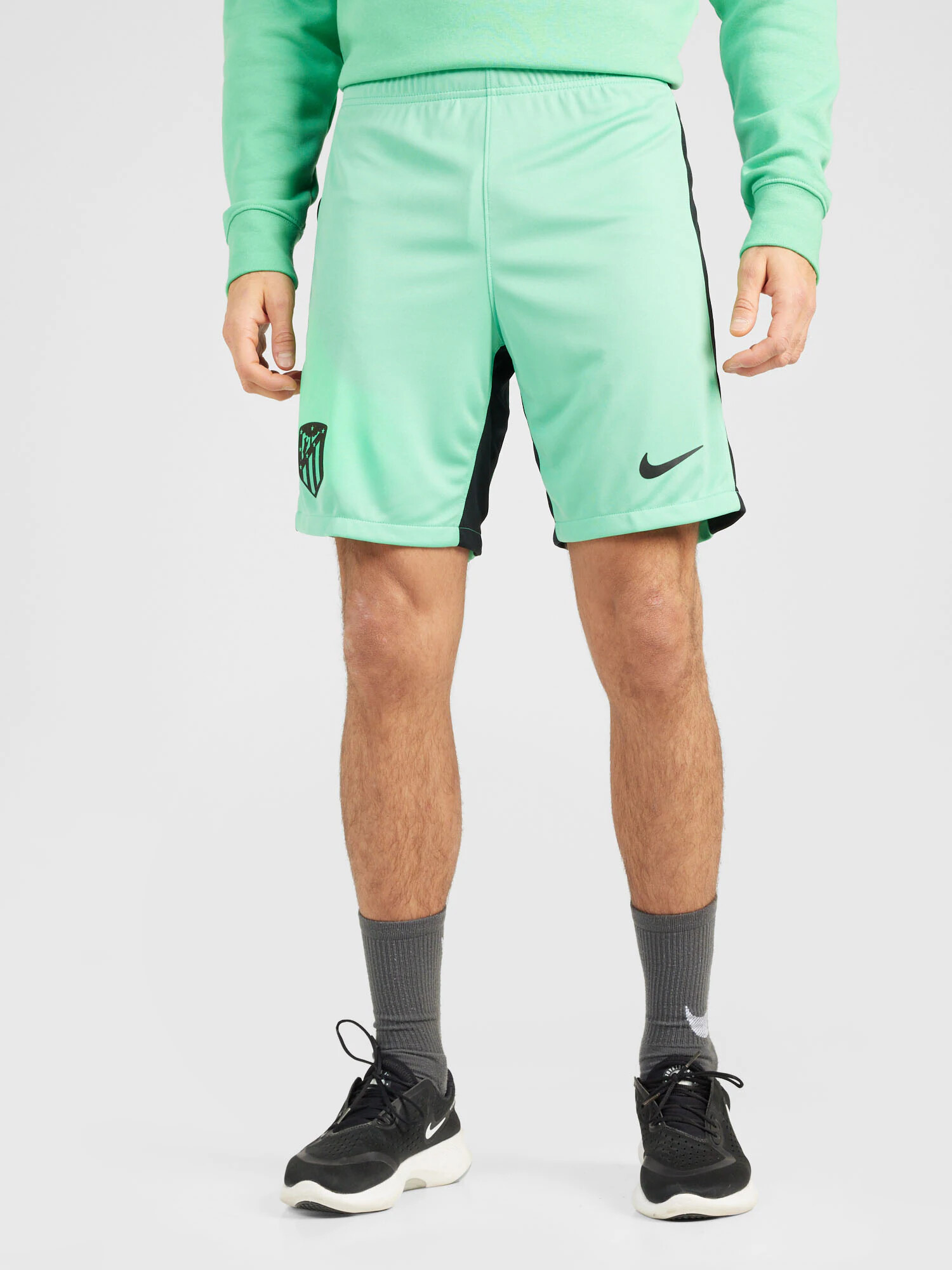 NIKE Pantaloni sport verde mentă / negru - Pled.ro