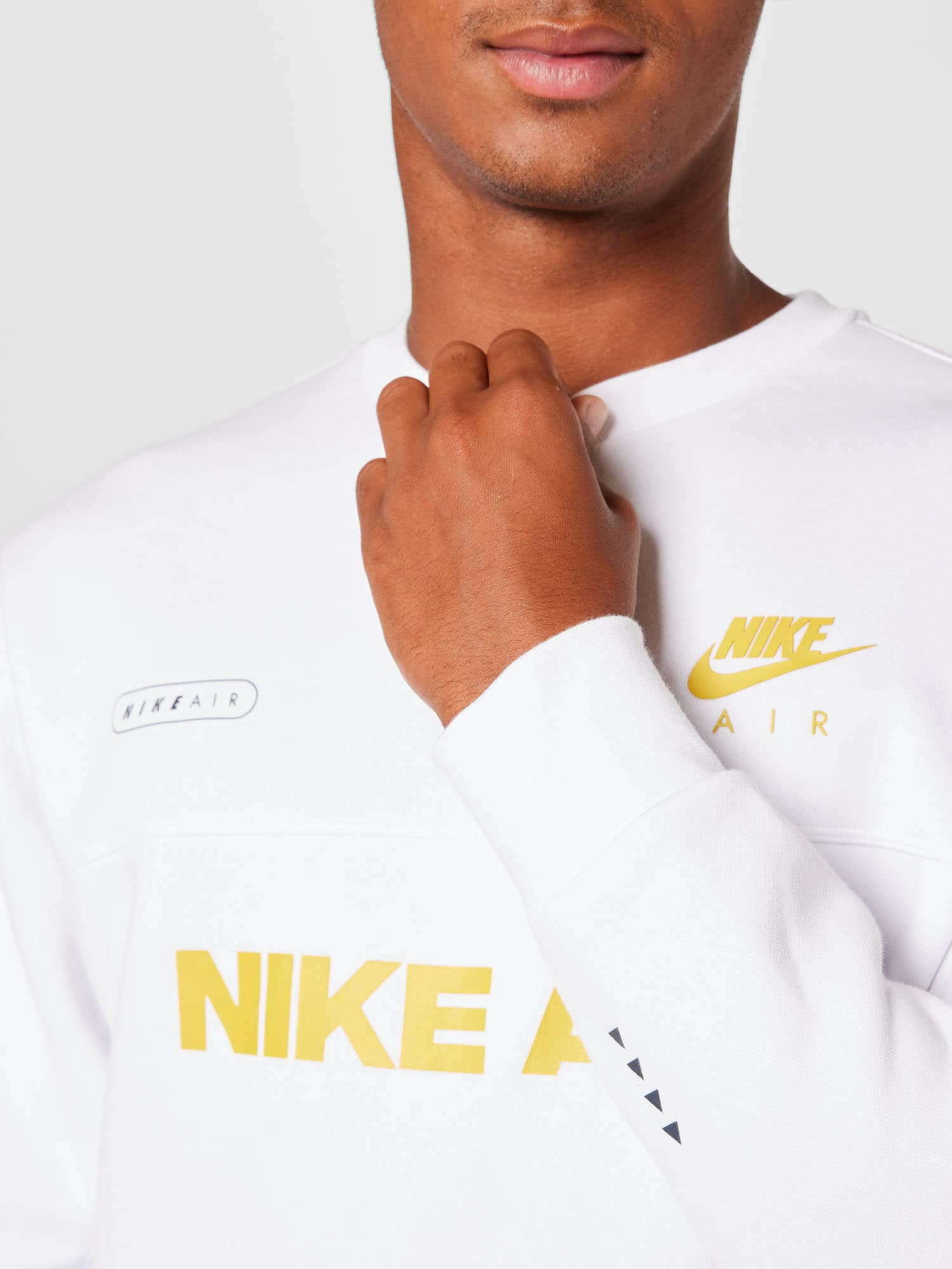 Nike Sportswear Bluză de molton auriu / alb - Pled.ro