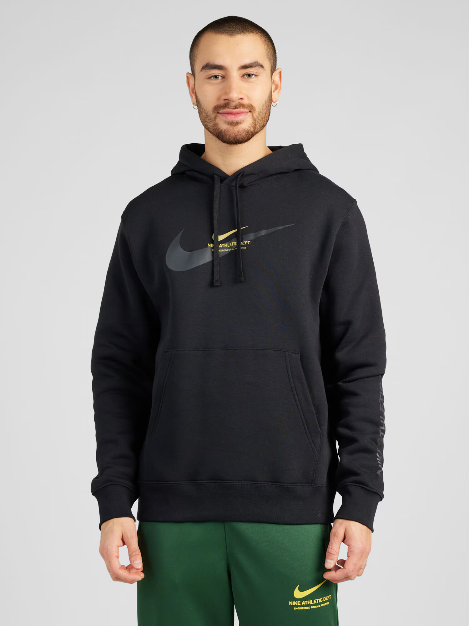 Nike Sportswear Bluză de molton galben / negru - Pled.ro