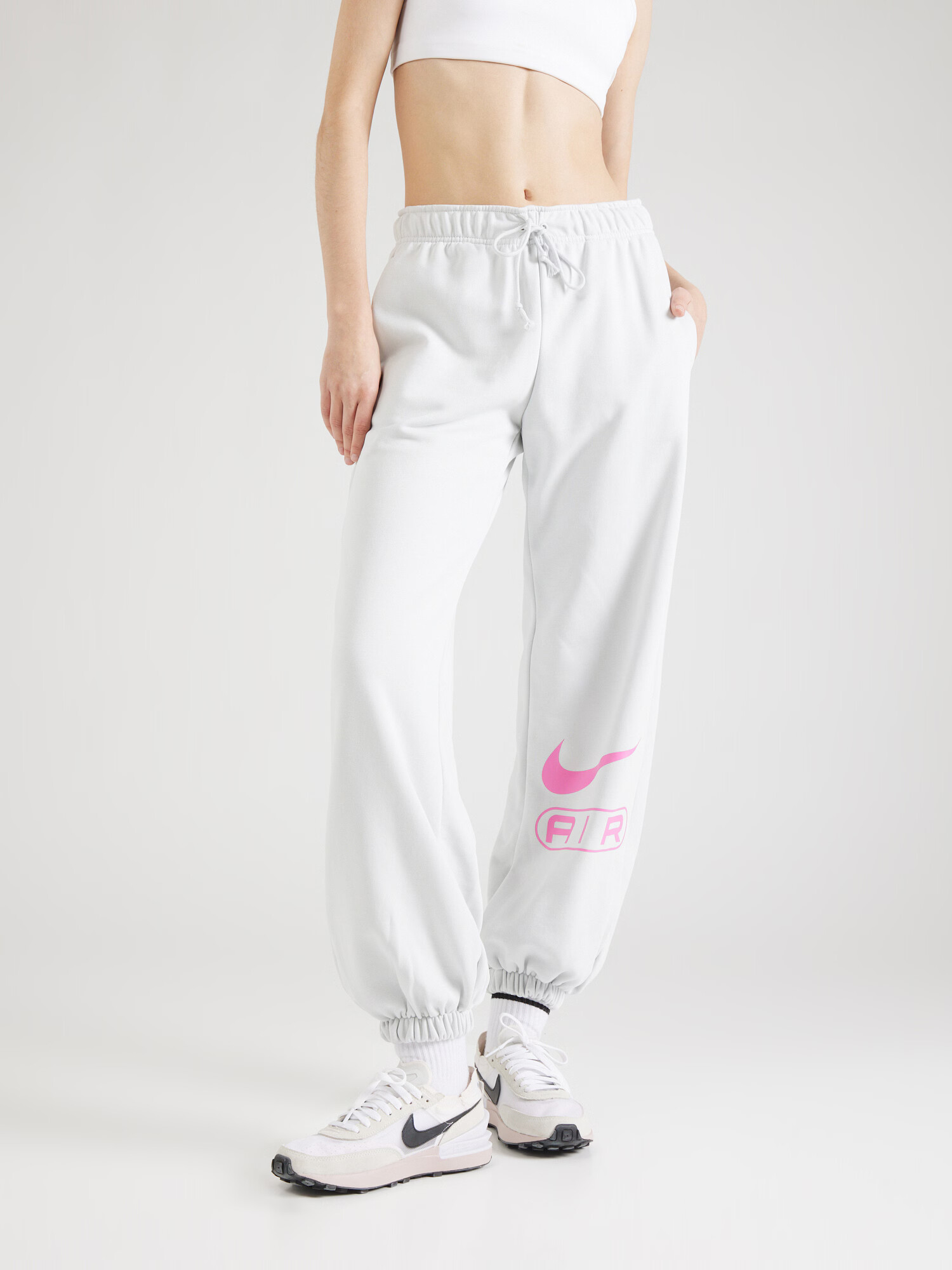 Nike Sportswear Pantaloni 'AIR' gri deschis / roz deschis - Pled.ro