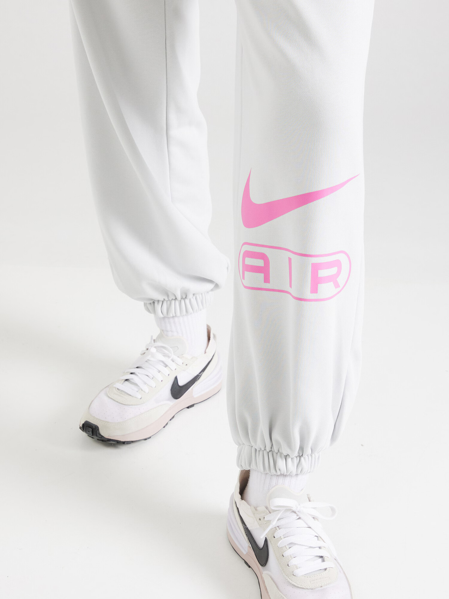 Nike Sportswear Pantaloni 'AIR' gri deschis / roz deschis - Pled.ro