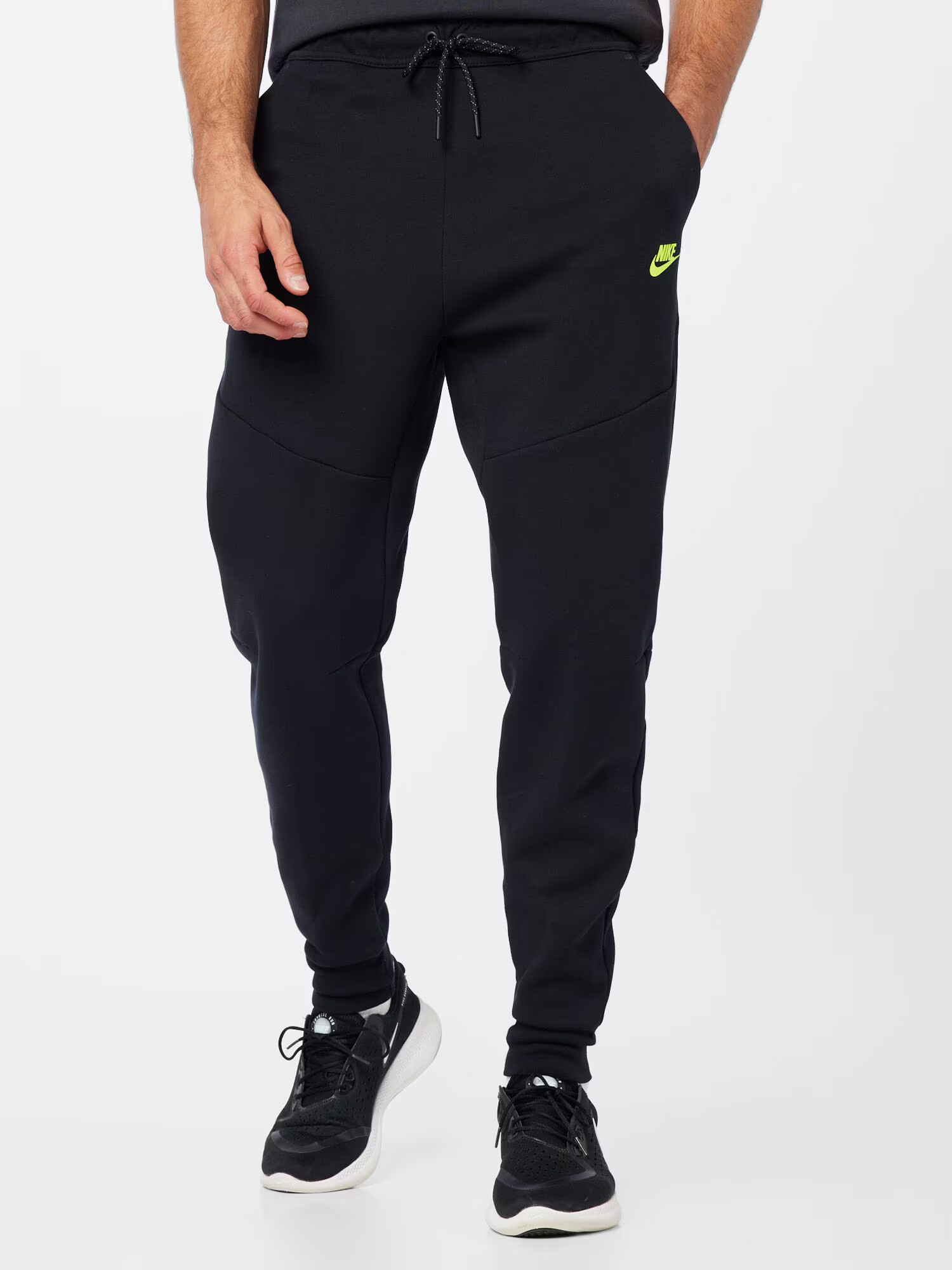 Nike Sportswear Pantaloni galben neon / negru - Pled.ro