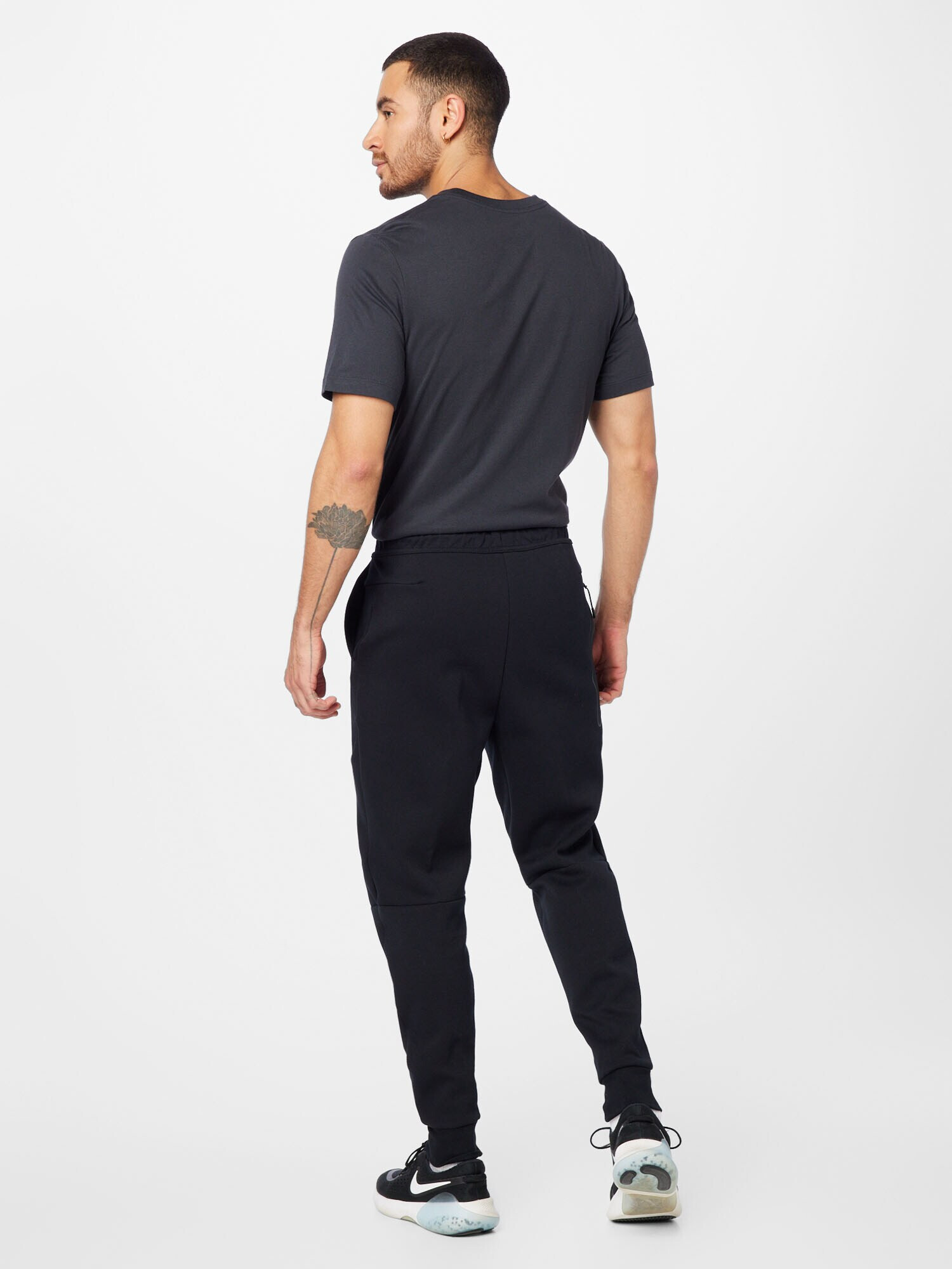 Nike Sportswear Pantaloni galben neon / negru - Pled.ro