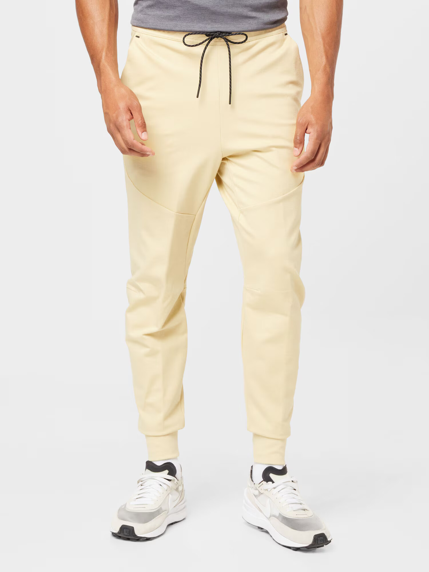 Nike Sportswear Pantaloni galben pastel - Pled.ro