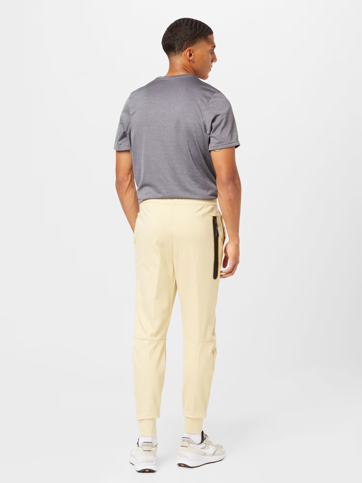 Nike Sportswear Pantaloni galben pastel - Pled.ro