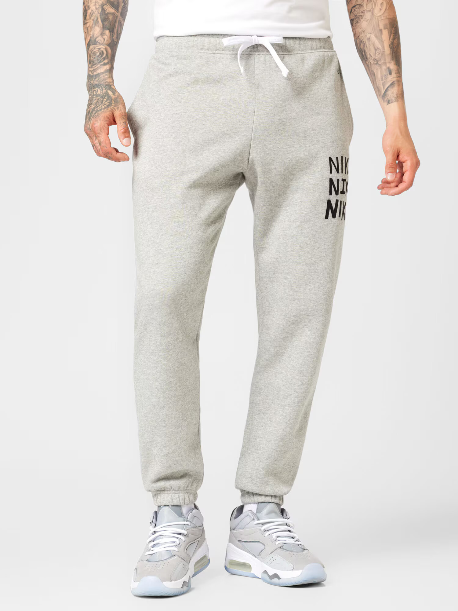 Nike Sportswear Pantaloni gri amestecat - Pled.ro