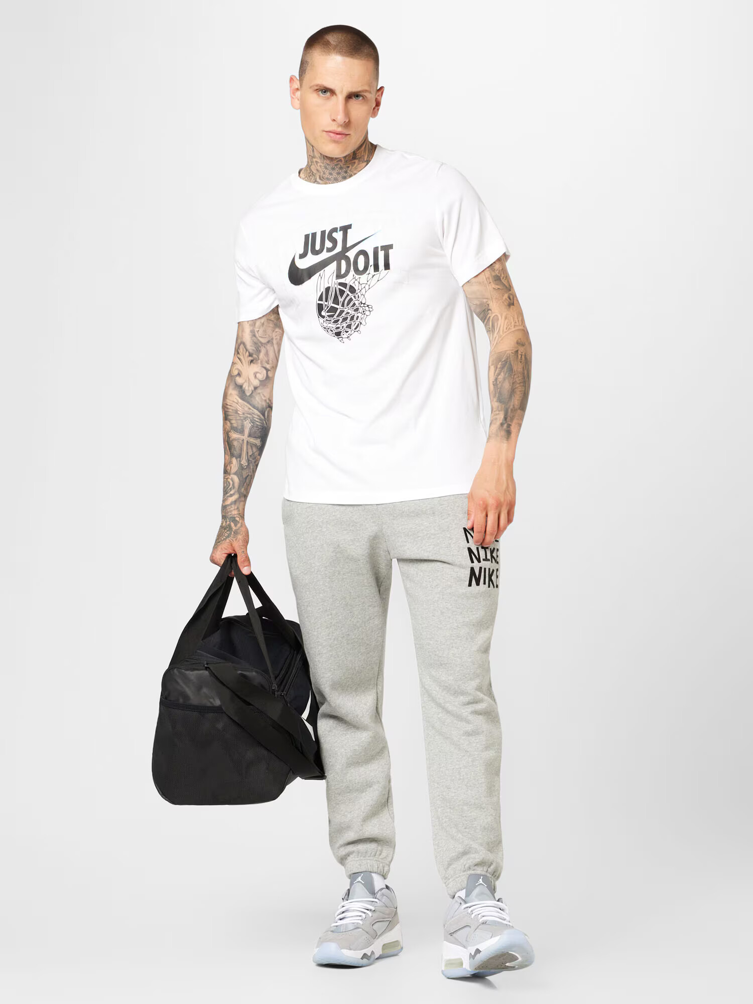 Nike Sportswear Pantaloni gri amestecat - Pled.ro