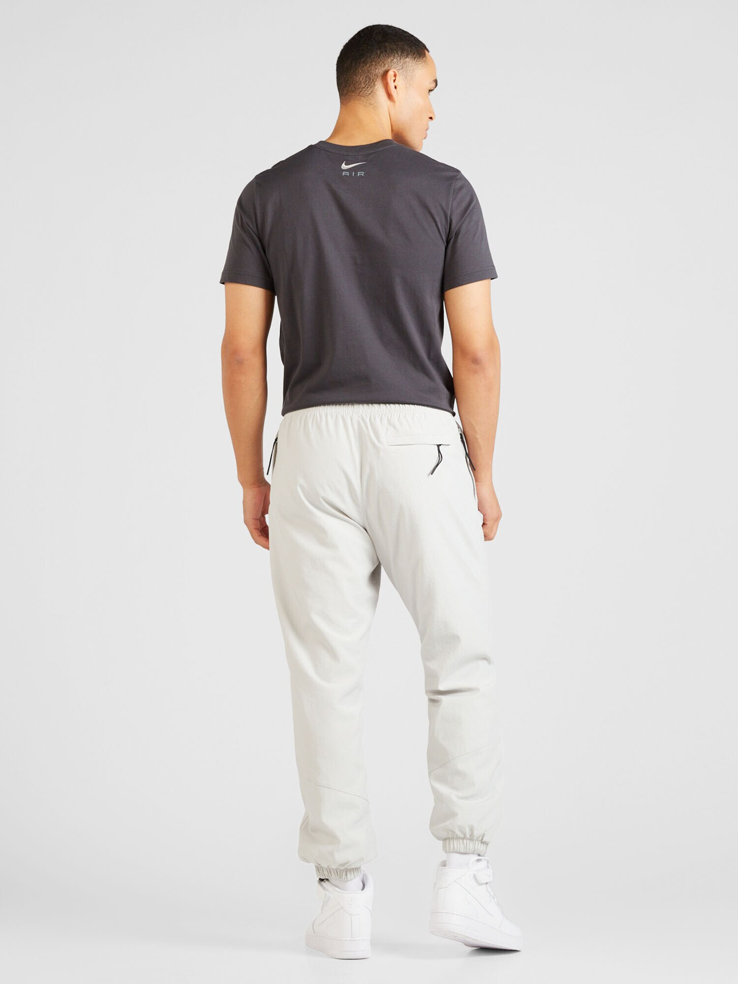 Nike Sportswear Pantaloni gri deschis / negru - Pled.ro