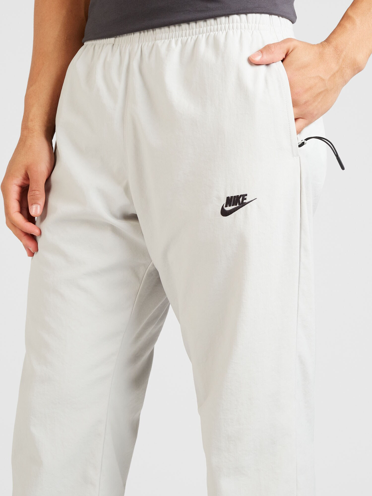 Nike Sportswear Pantaloni gri deschis / negru - Pled.ro