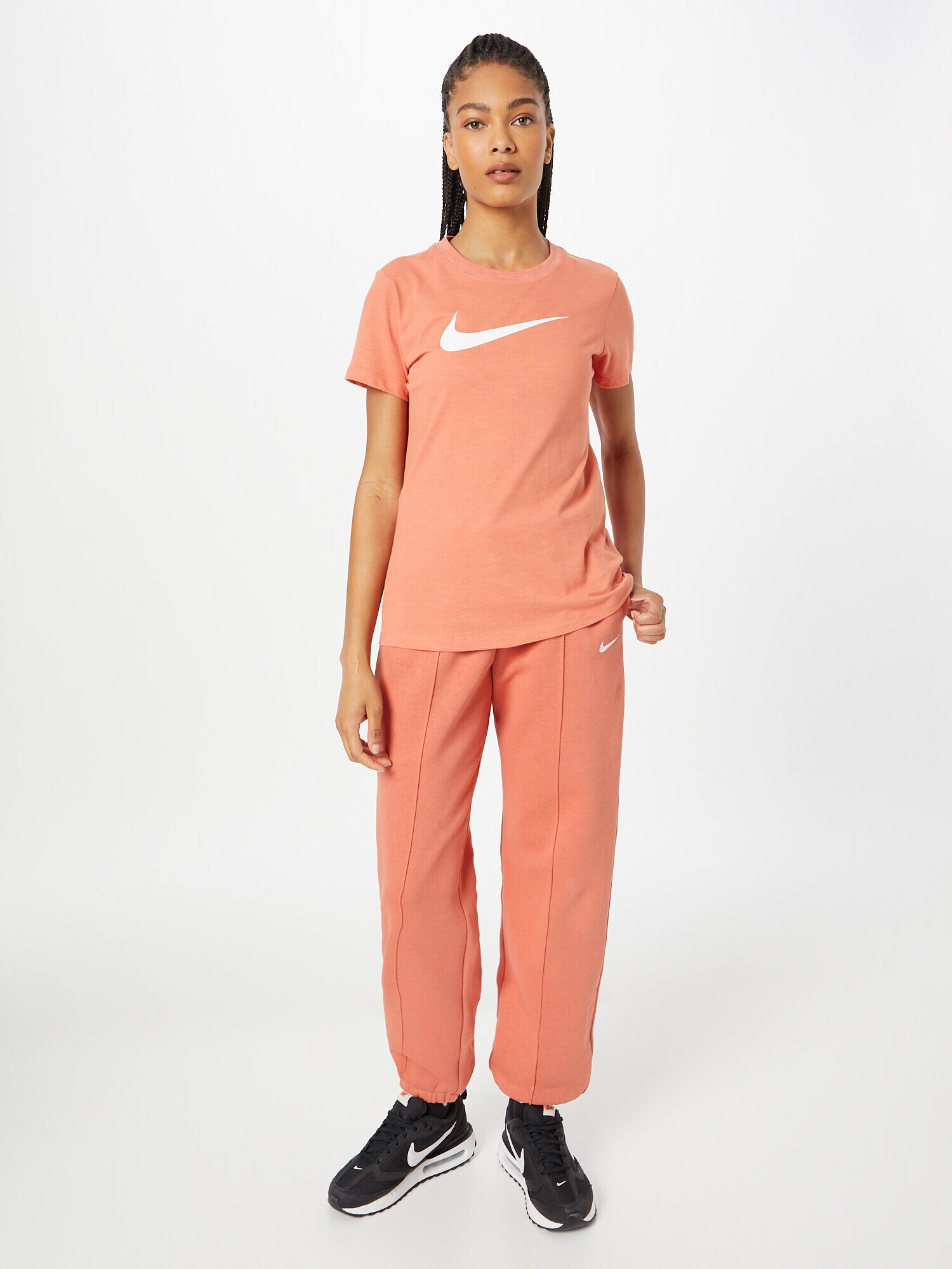 Nike Sportswear Pantaloni portocaliu piersică - Pled.ro