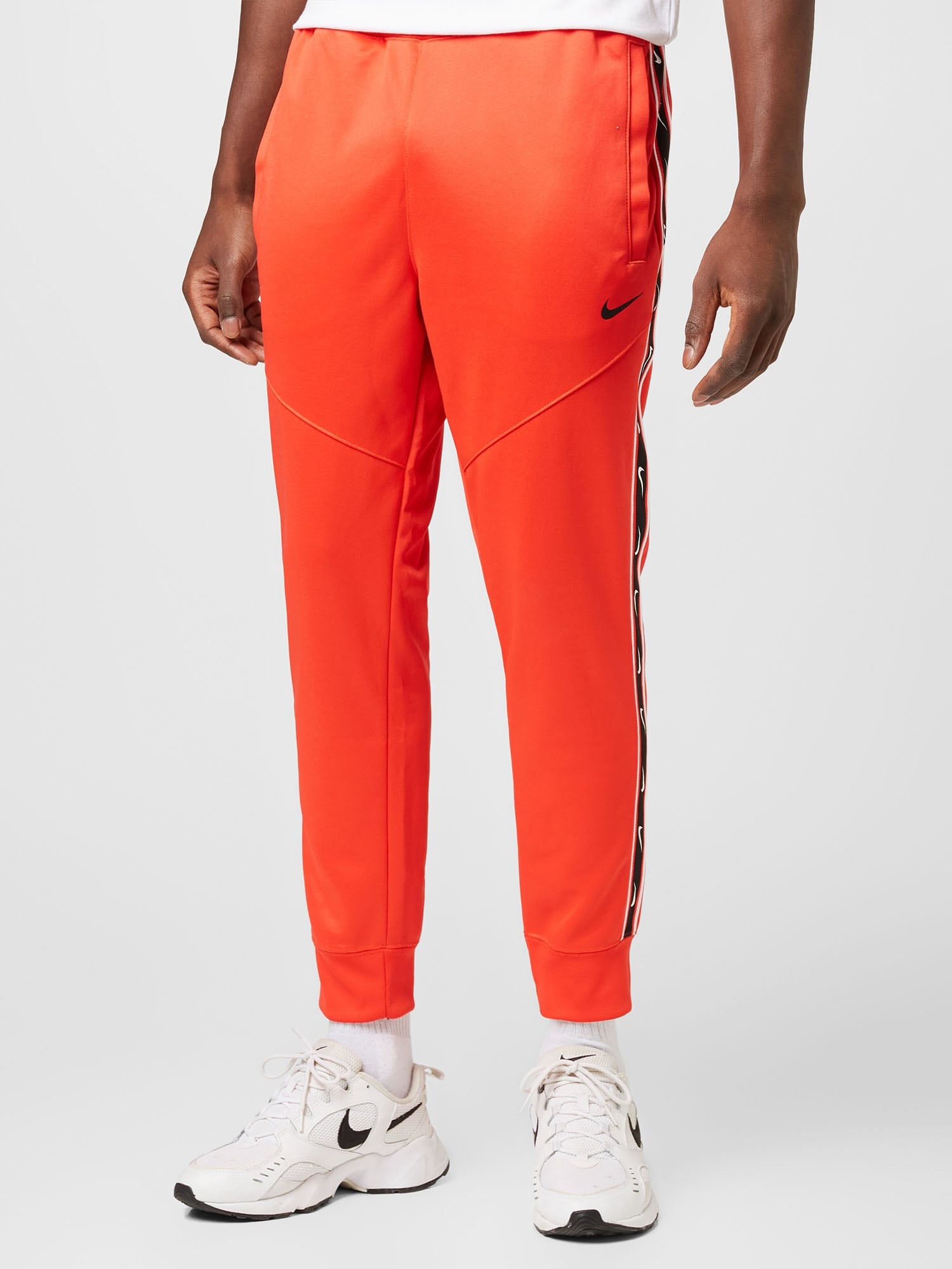 Nike Sportswear Pantaloni roși aprins / negru / alb - Pled.ro