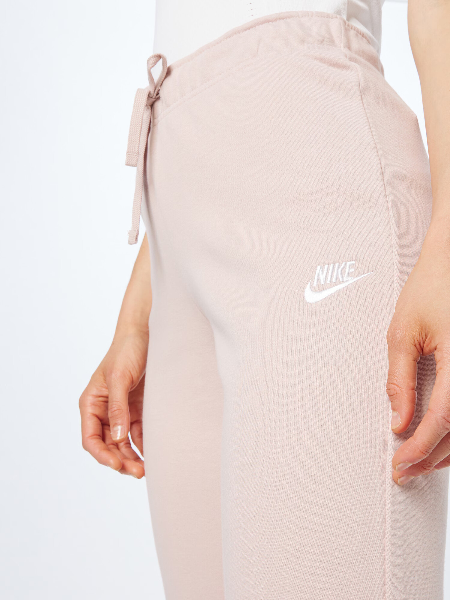 Nike Sportswear Pantaloni roz pudră / alb - Pled.ro