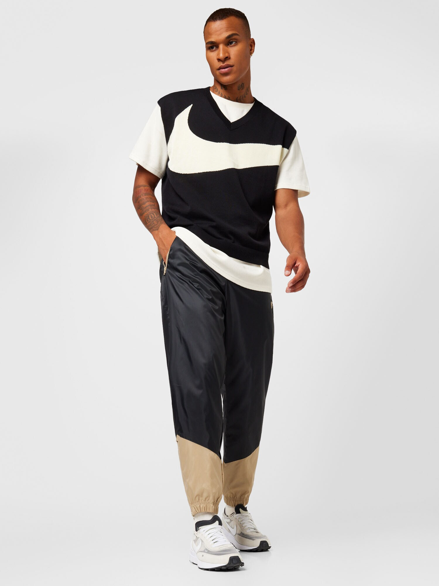 Nike Sportswear Pantaloni șamoa / negru - Pled.ro