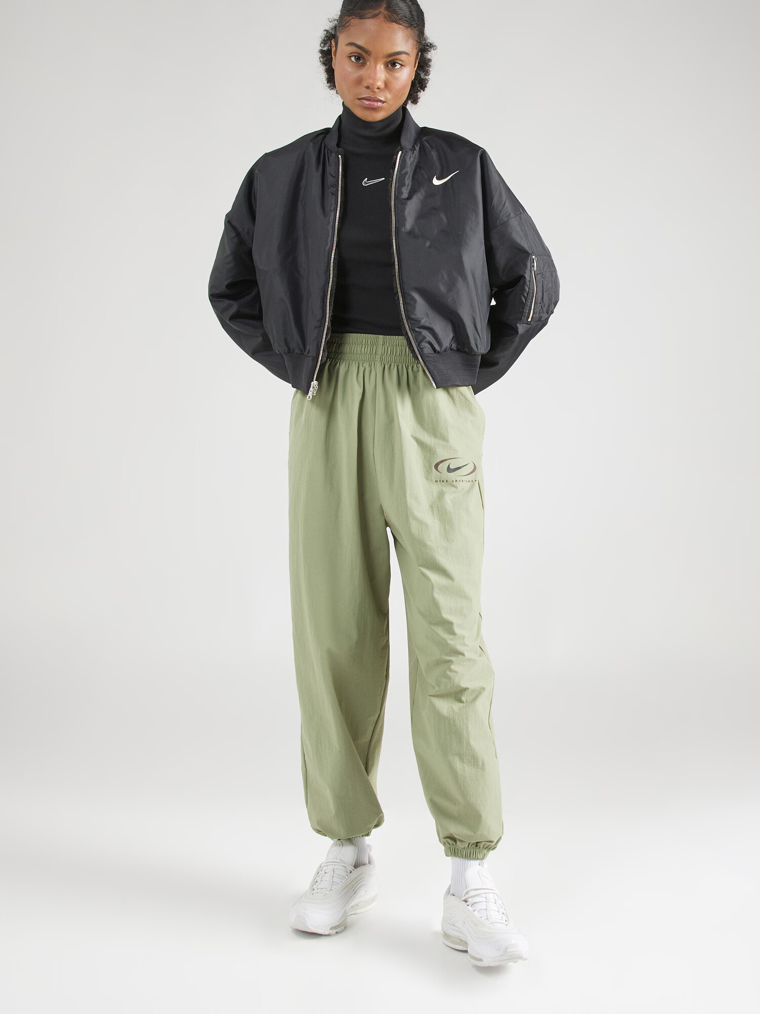 Nike Sportswear Pantaloni verde măr / negru - Pled.ro