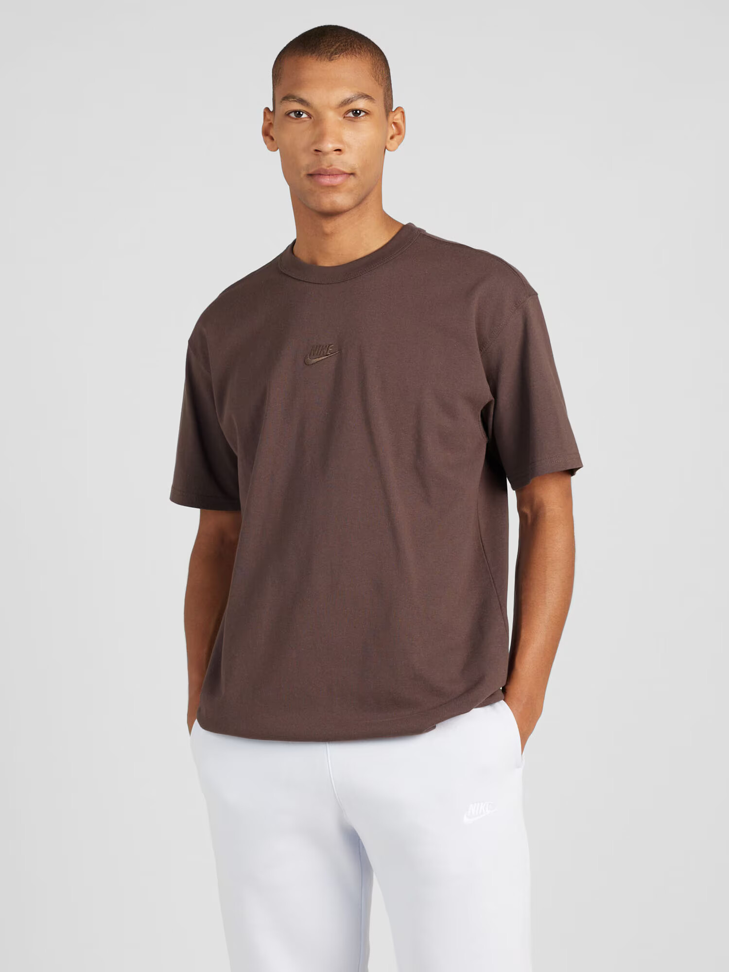 Nike Sportswear Tricou funcțional 'ESSENTIAL' maro - Pled.ro