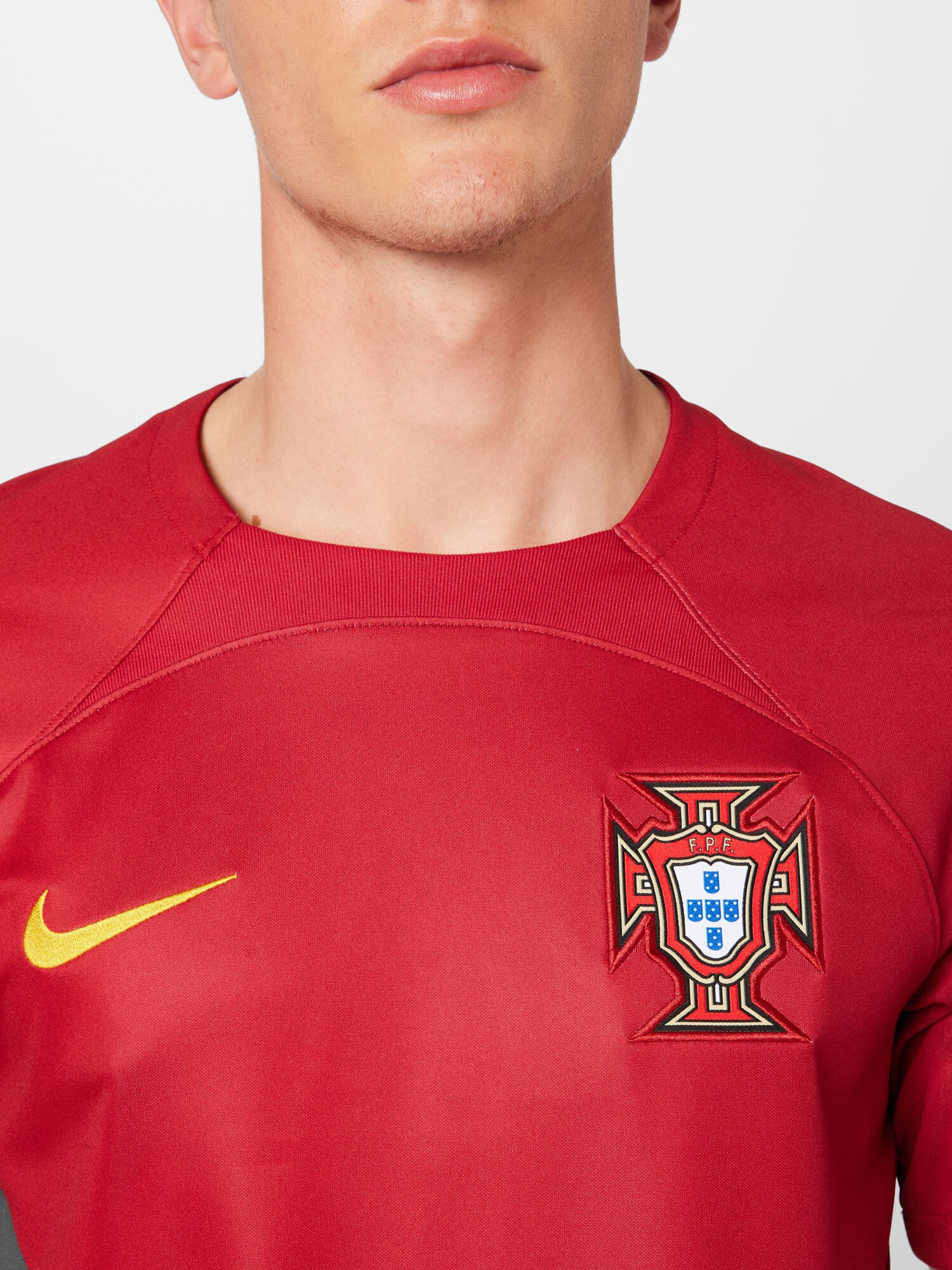 NIKE Tricou funcțional 'Portugal 2022 Heim' verde iarbă / portocaliu deschis / roșu / alb - Pled.ro