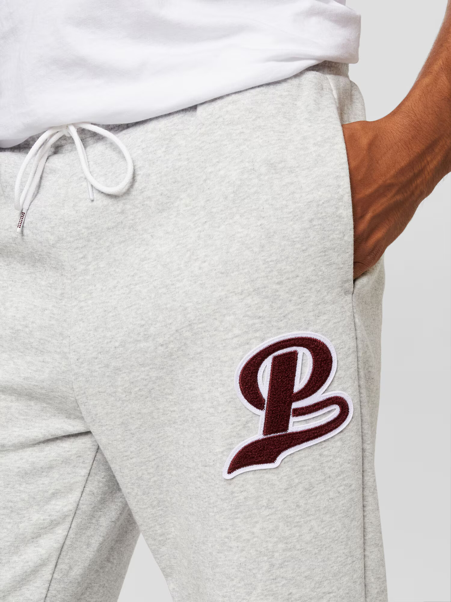 PUMA Pantaloni gri amestecat / roșu burgundy - Pled.ro