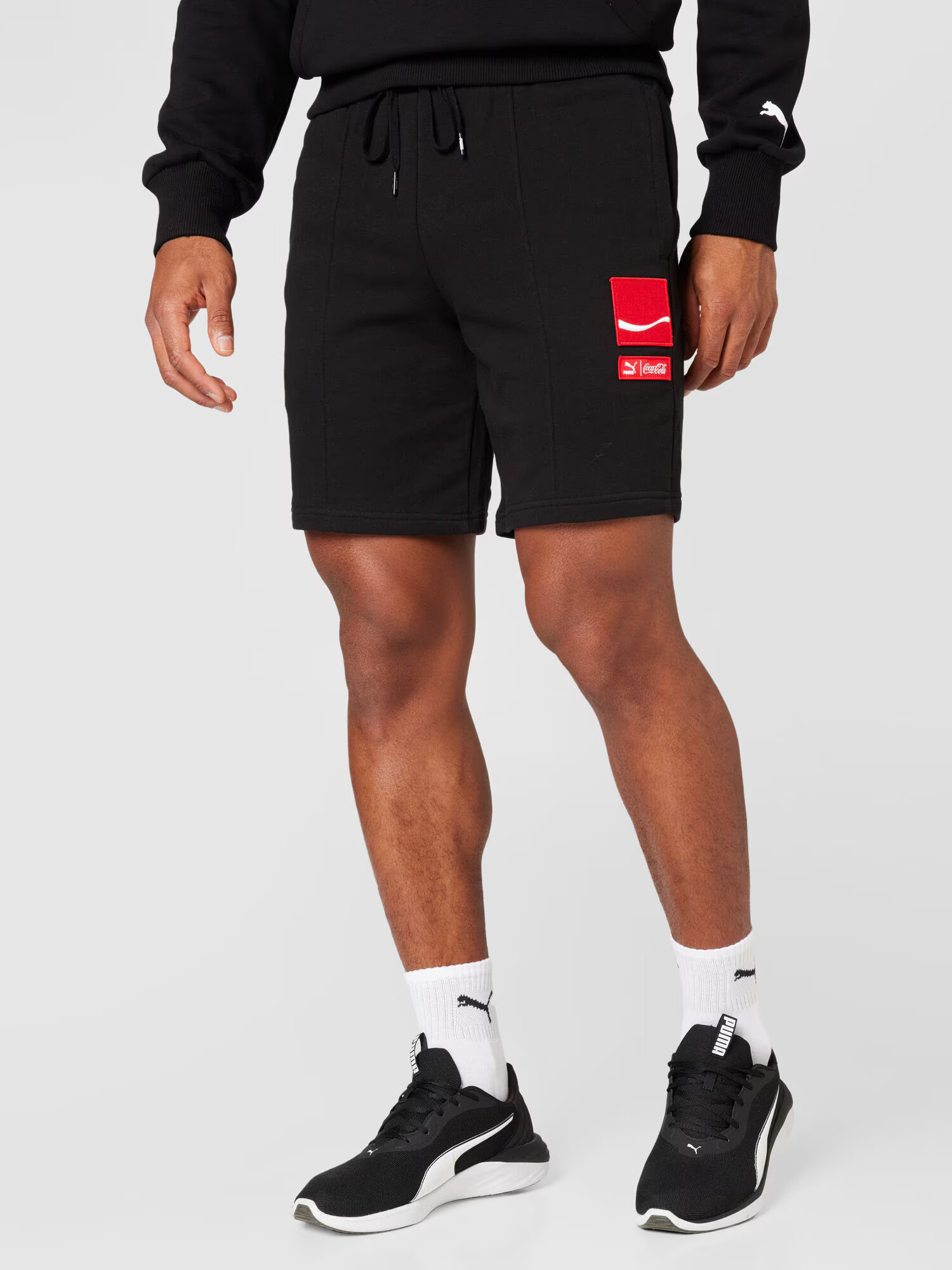 PUMA Pantaloni roşu închis / negru / alb - Pled.ro