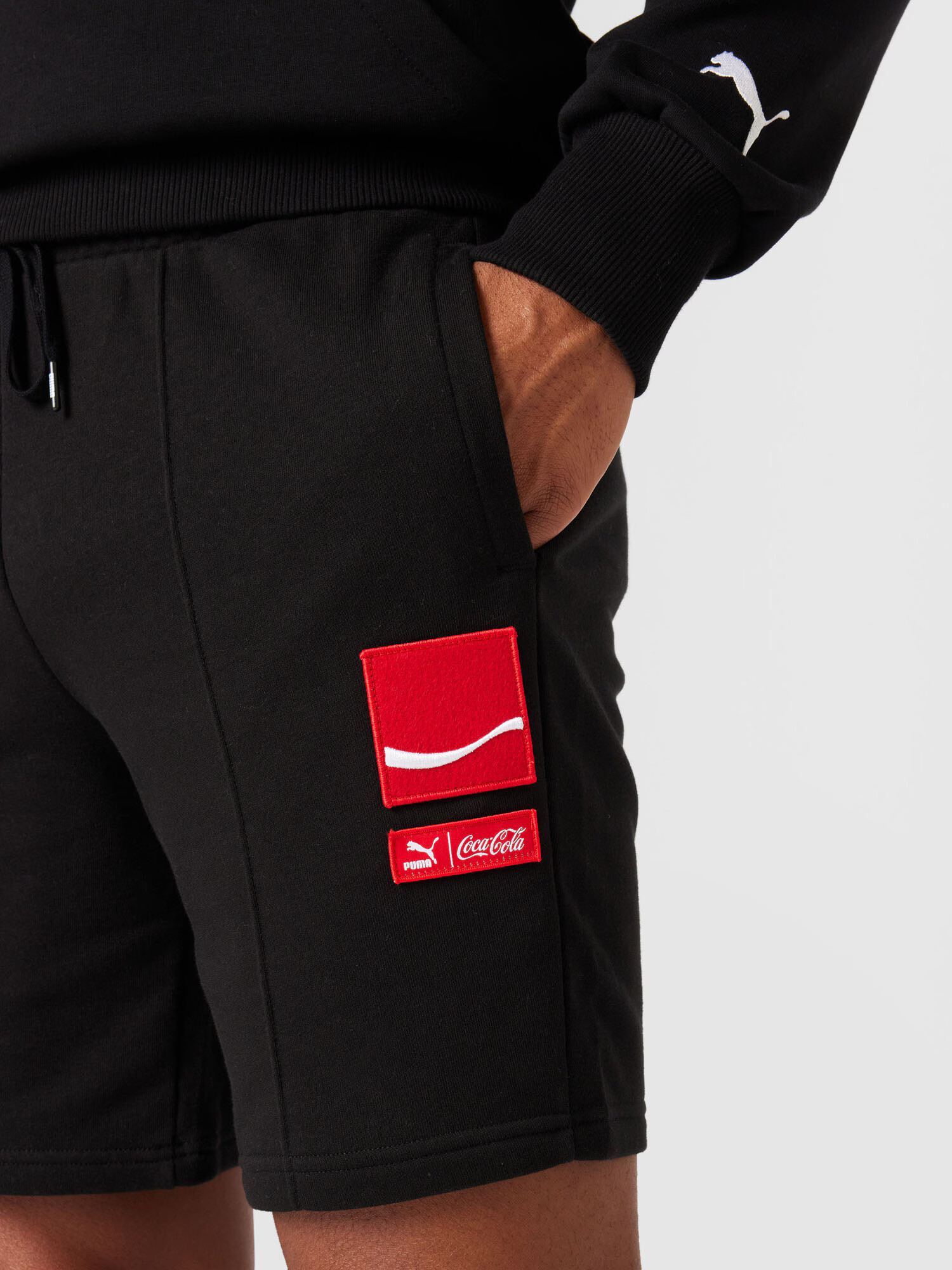 PUMA Pantaloni roşu închis / negru / alb - Pled.ro