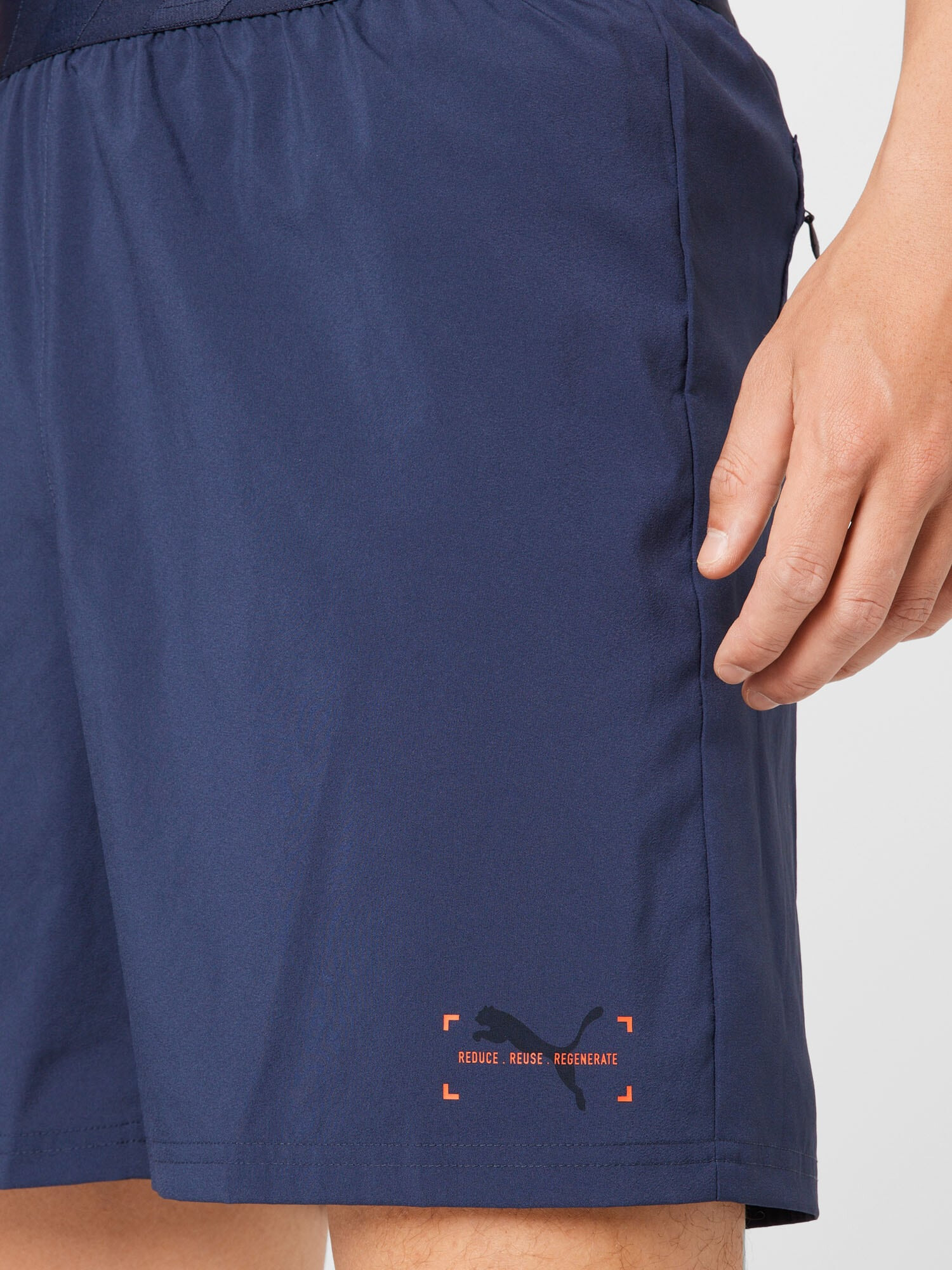 PUMA Pantaloni sport bleumarin / portocaliu / alb - Pled.ro