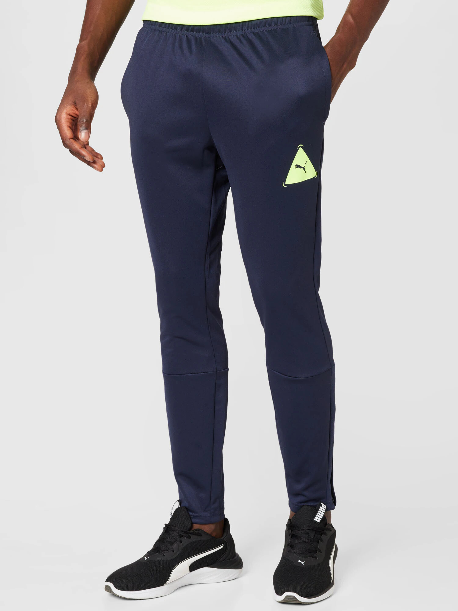 PUMA Pantaloni sport bleumarin / verde limetă - Pled.ro