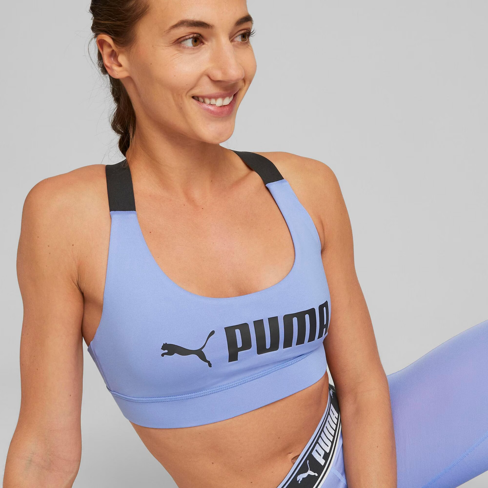 PUMA Sutien sport mov deschis / negru - Pled.ro