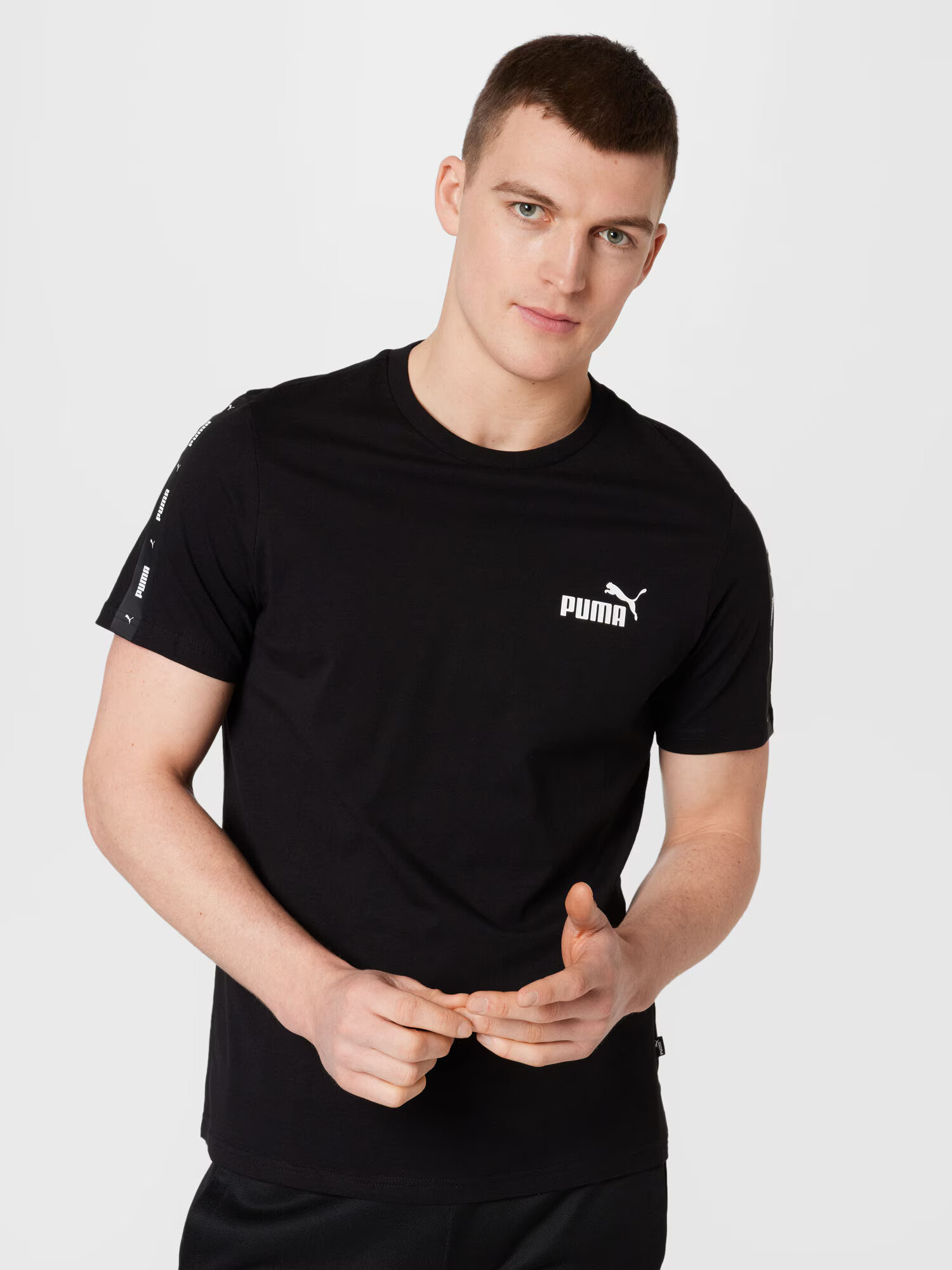 PUMA Tricou funcțional 'ESS+ LOGO' gri / negru / alb - Pled.ro