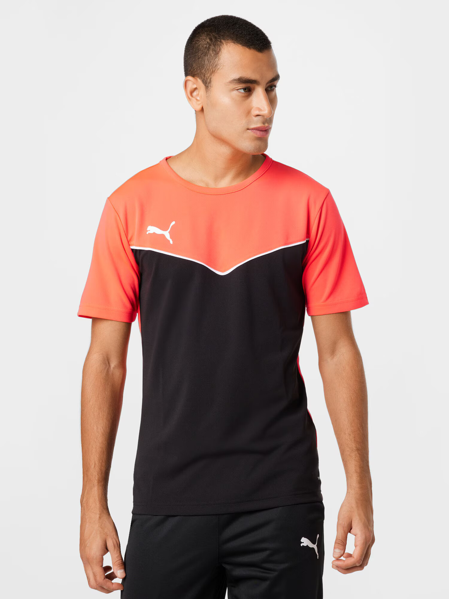 PUMA Tricou funcțional 'Individual Rise' corai / negru / alb - Pled.ro