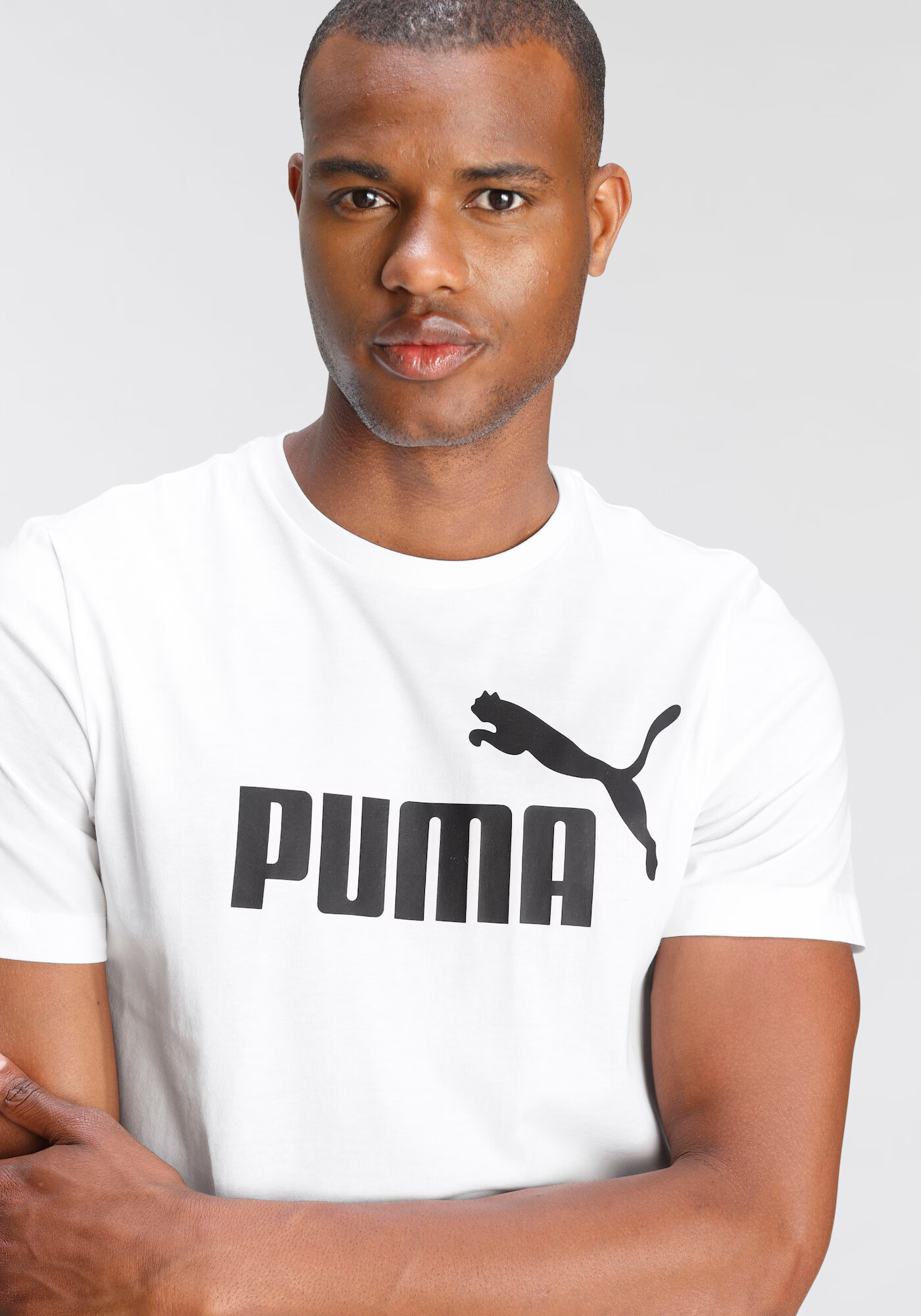 PUMA Tricou funcțional 'Essential' negru / alb - Pled.ro