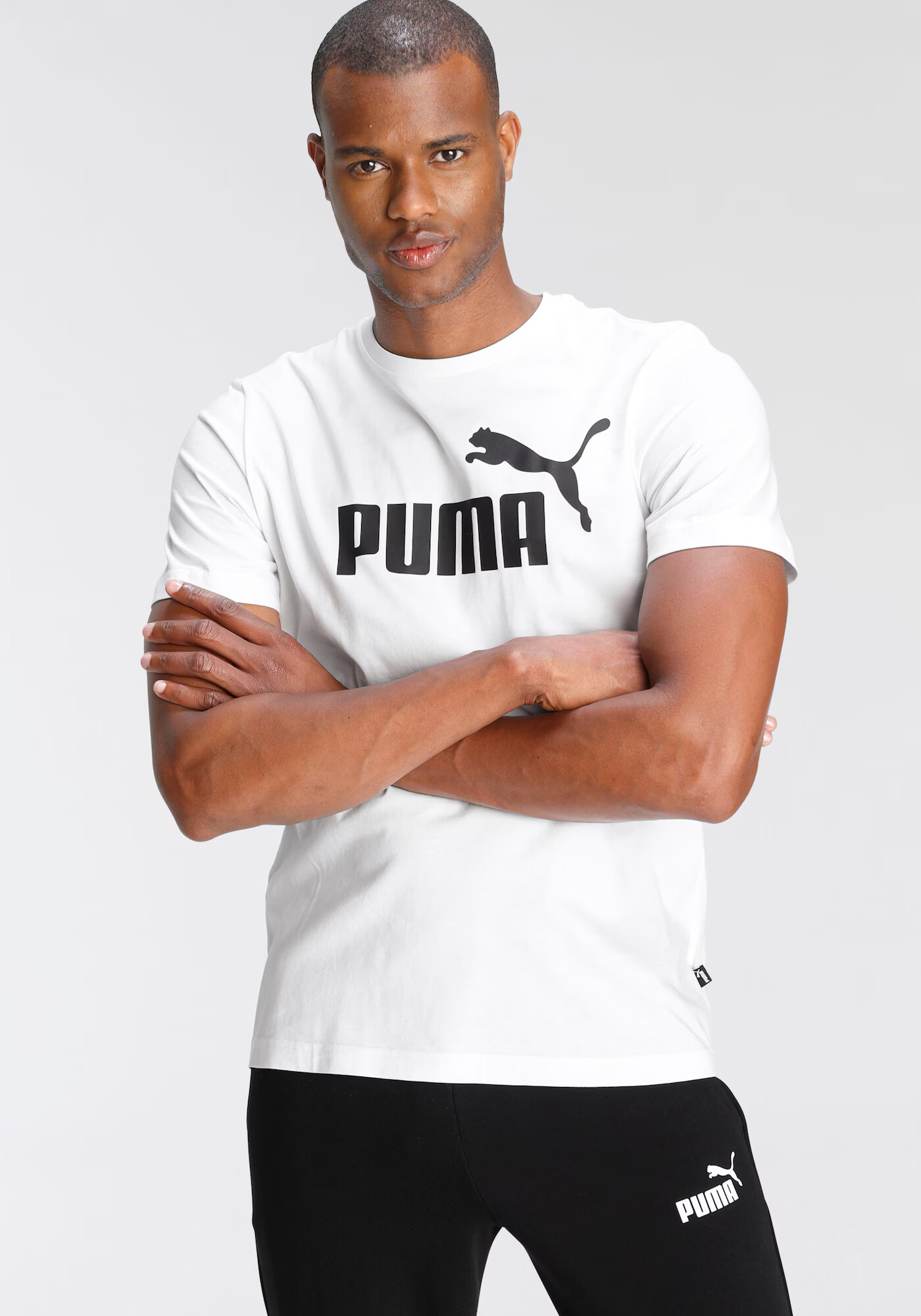 PUMA Tricou funcțional 'Essential' negru / alb - Pled.ro